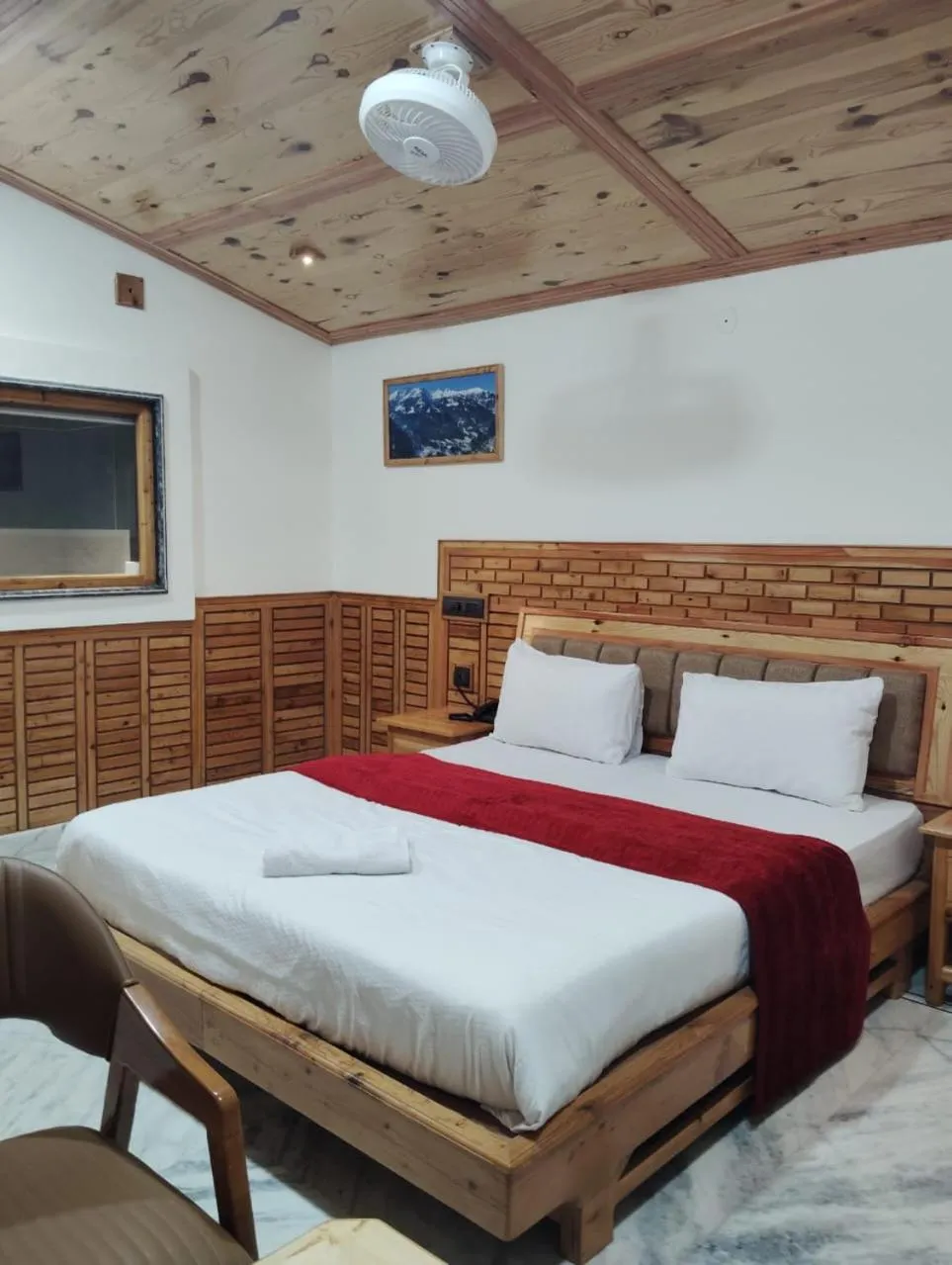 Bed in Hotel CM Palace - Pure Vegetarian