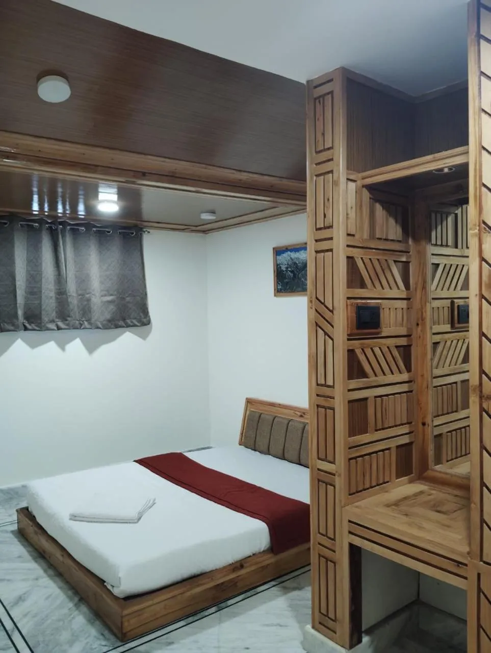 Bed in Hotel CM Palace - Pure Vegetarian