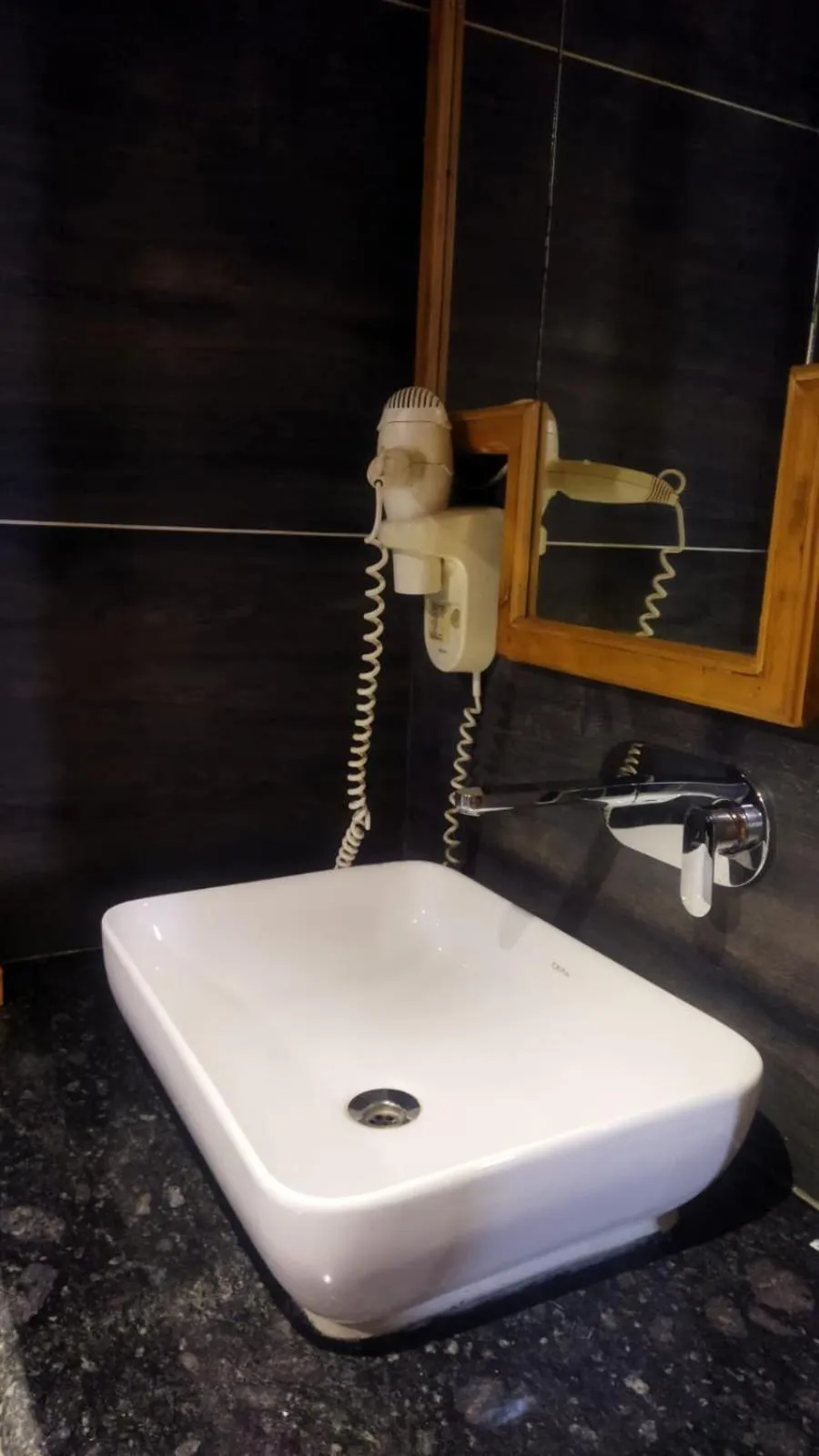 Bathroom in Hotel CM Palace - Pure Vegetarian