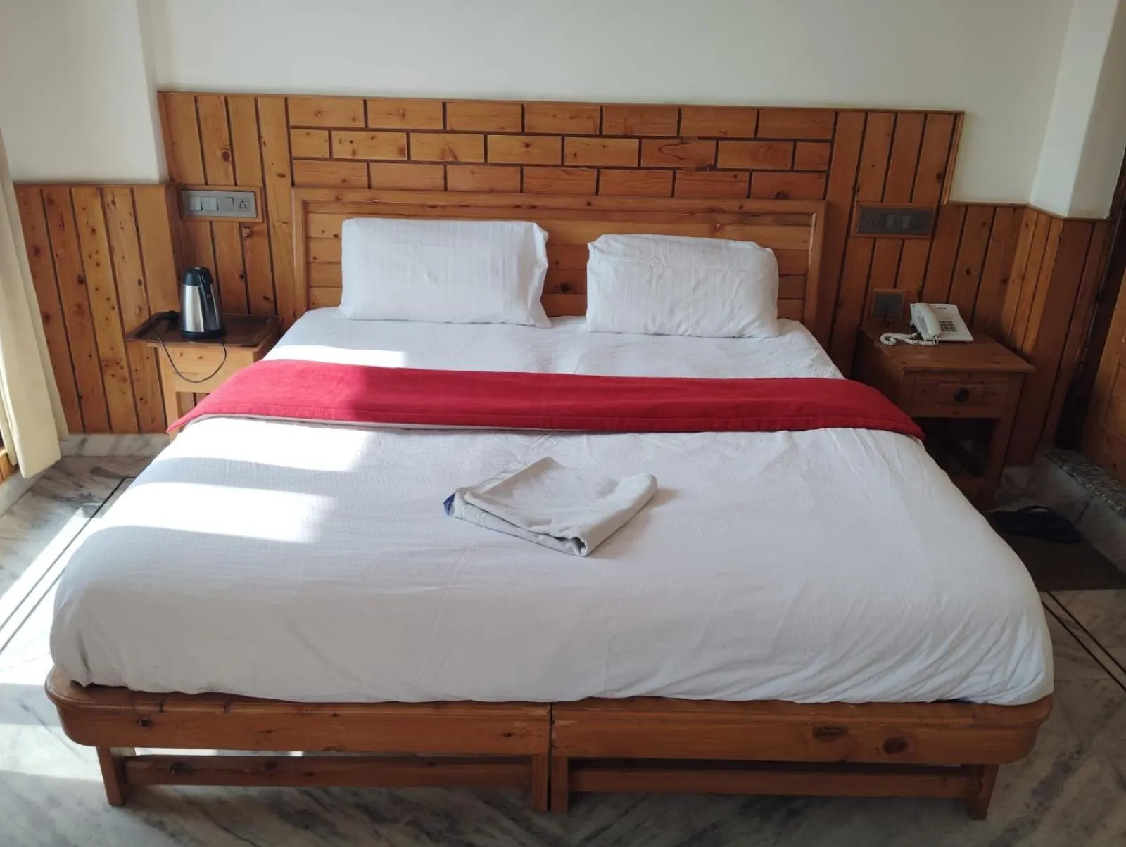 Bed in Hotel CM Palace - Pure Vegetarian