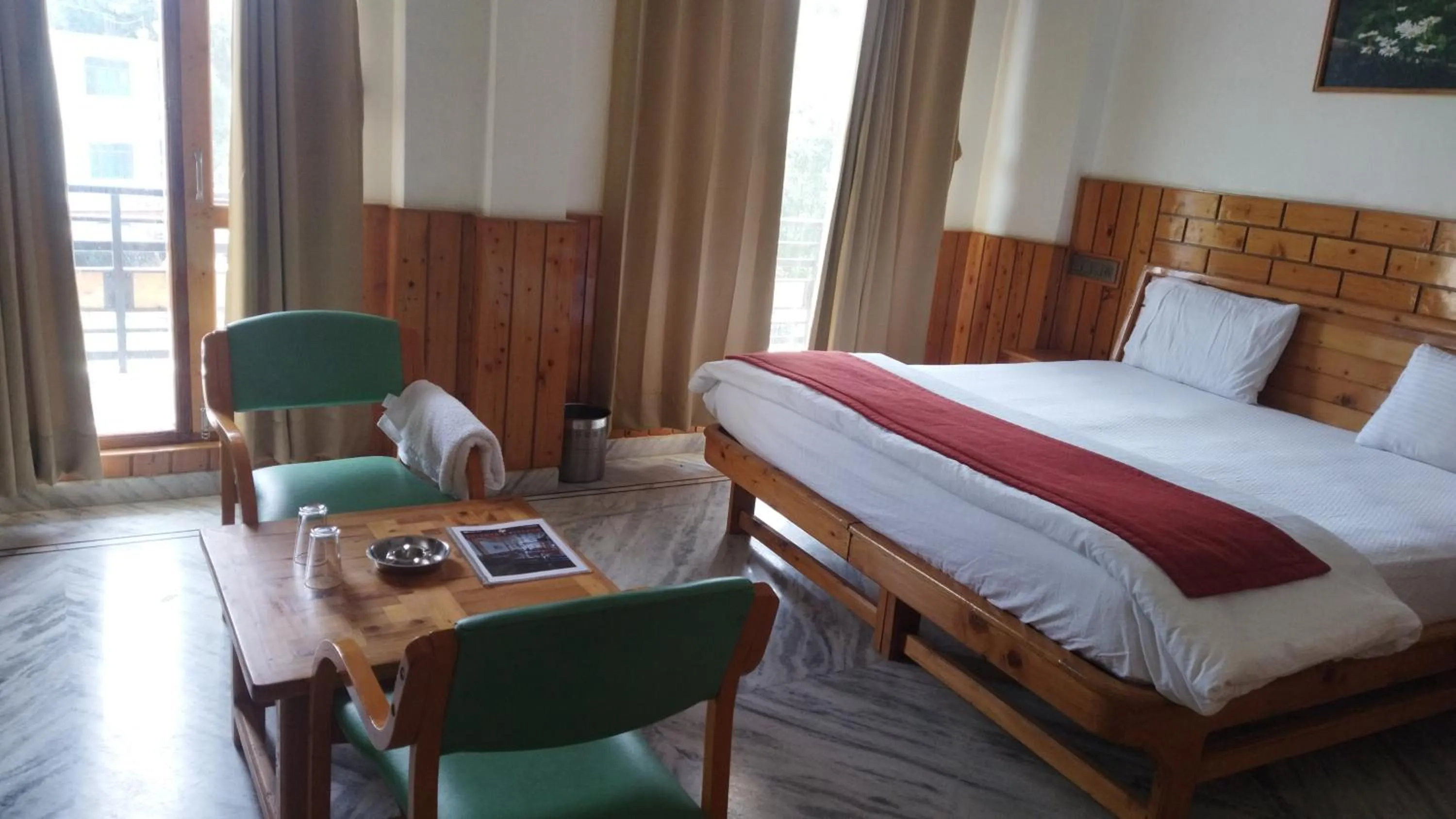 Bedroom, Bed in Hotel CM Palace - Pure Vegetarian