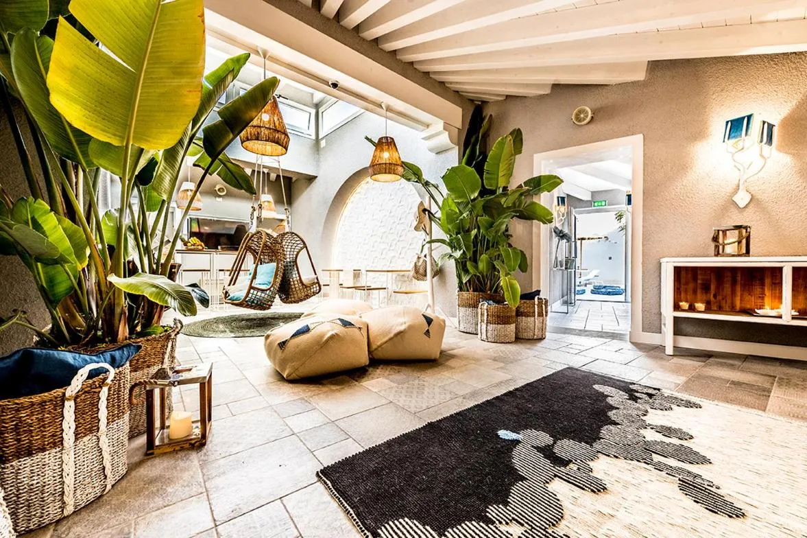 Lobby or reception in CapoBlu Hotel