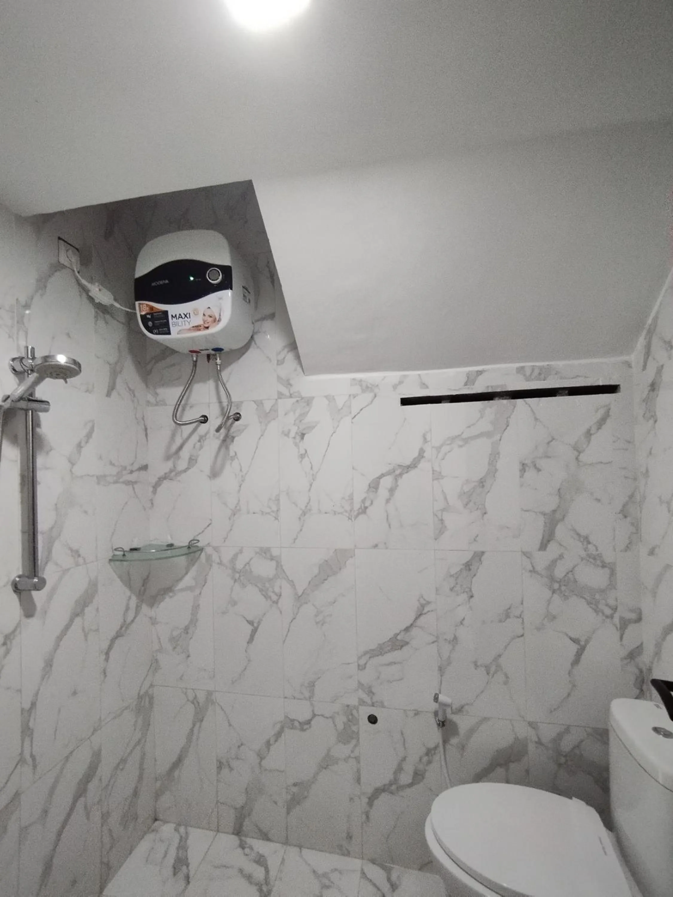 Bathroom in Saira Hotel dan Homestay Syariah