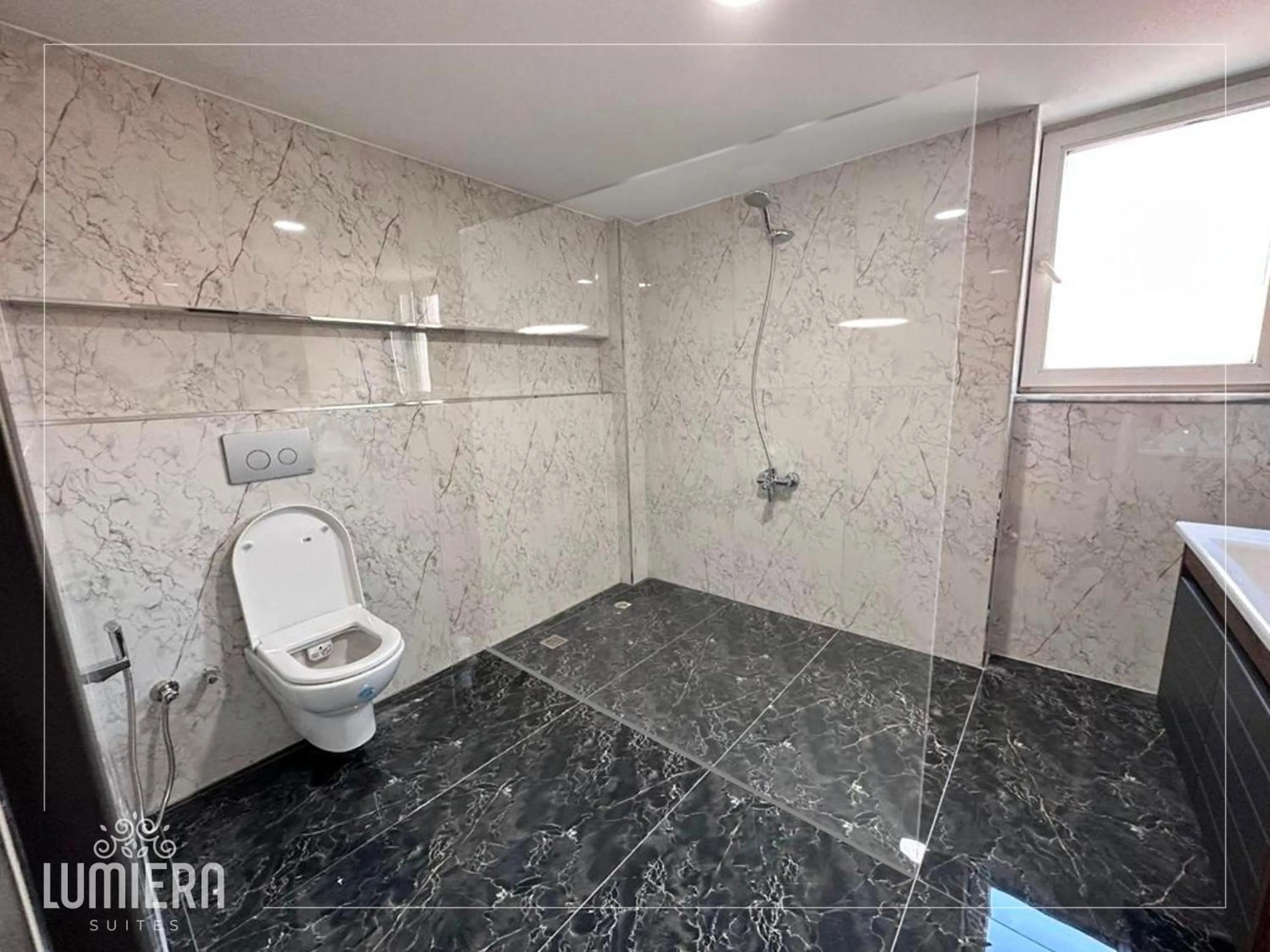 Shower in Lumiera Suites Hotel