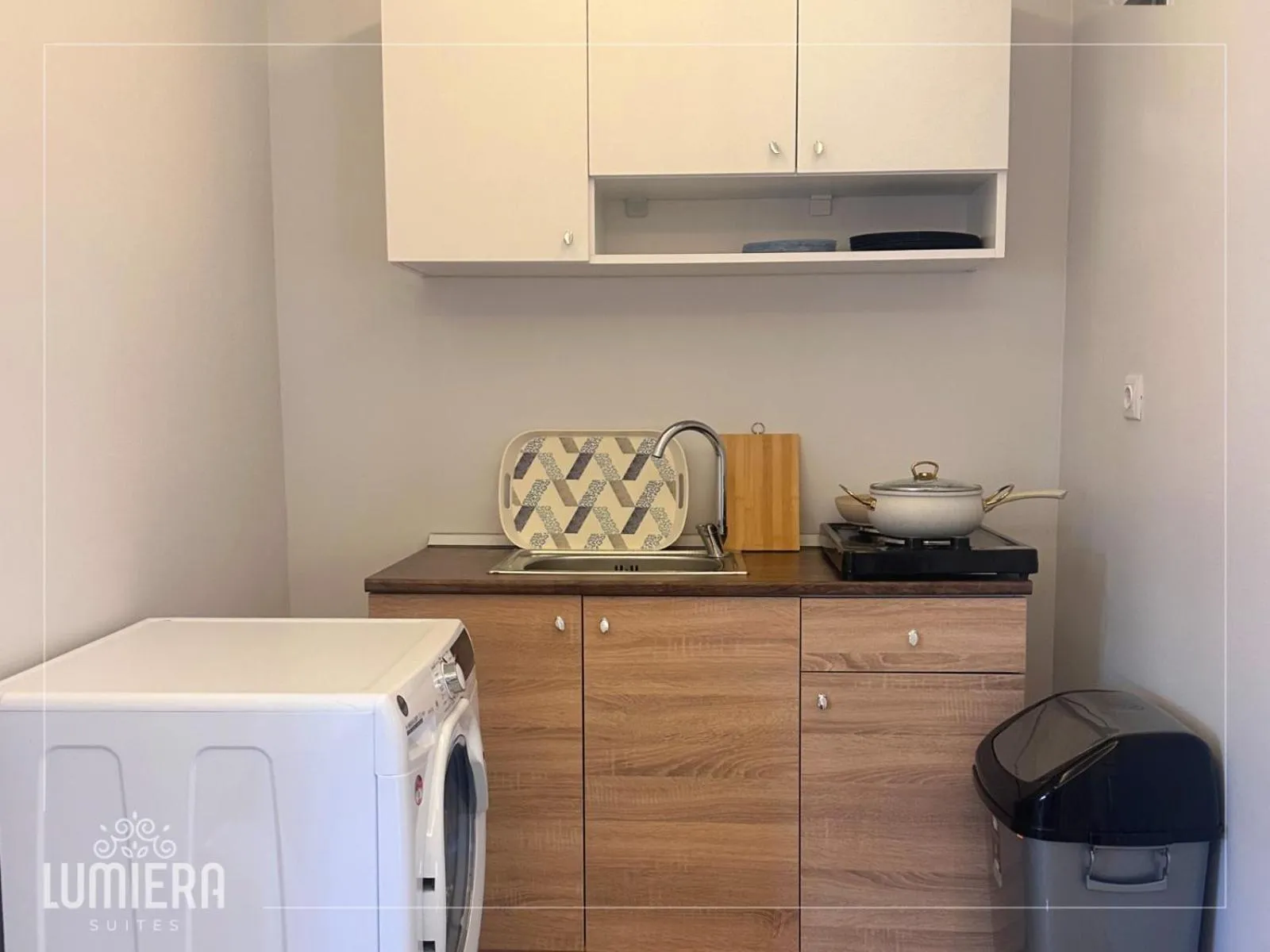 Kitchen or kitchenette in Lumiera Suites Hotel