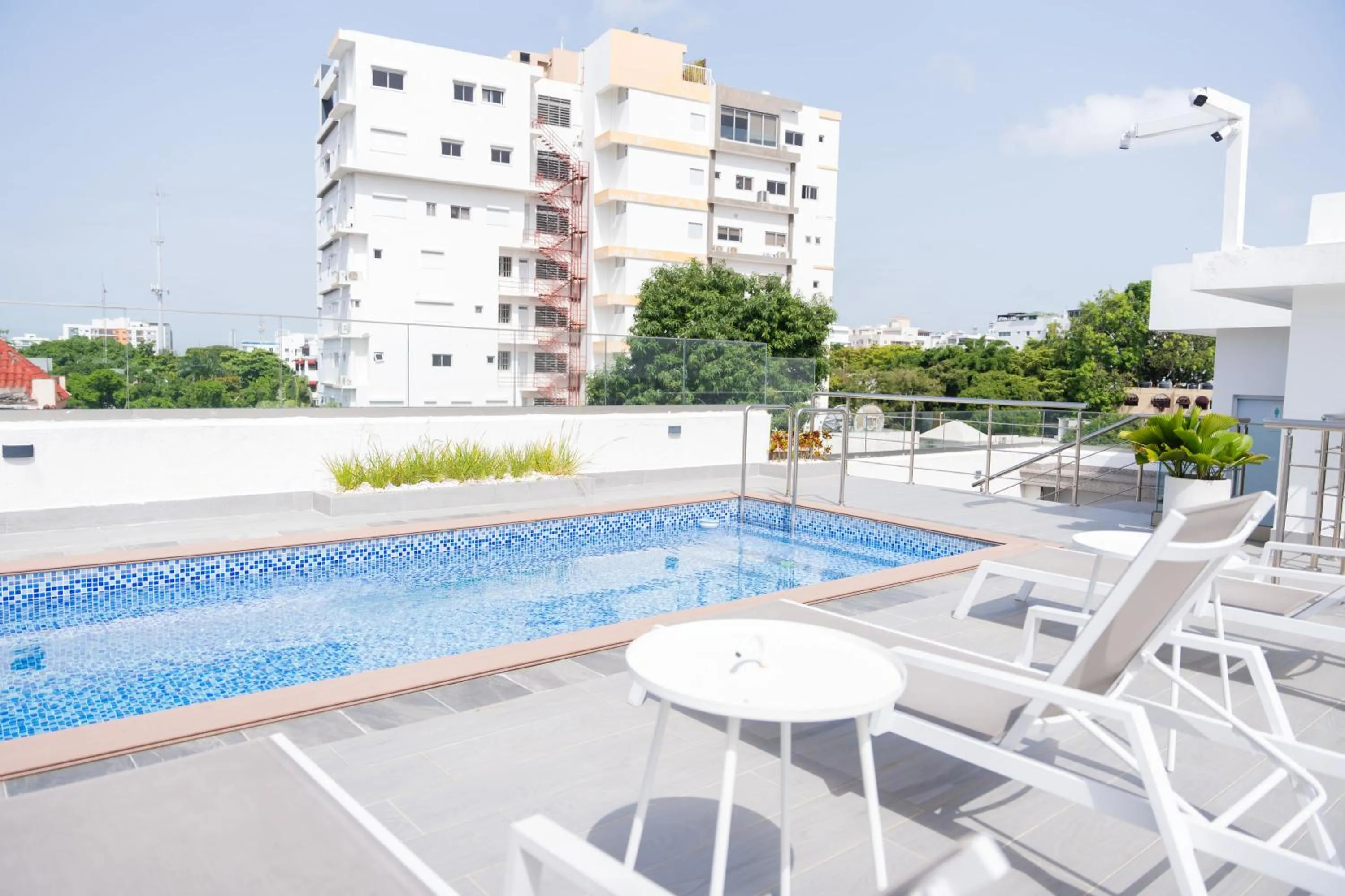 Swimming pool in Hotel Stay Here Suites