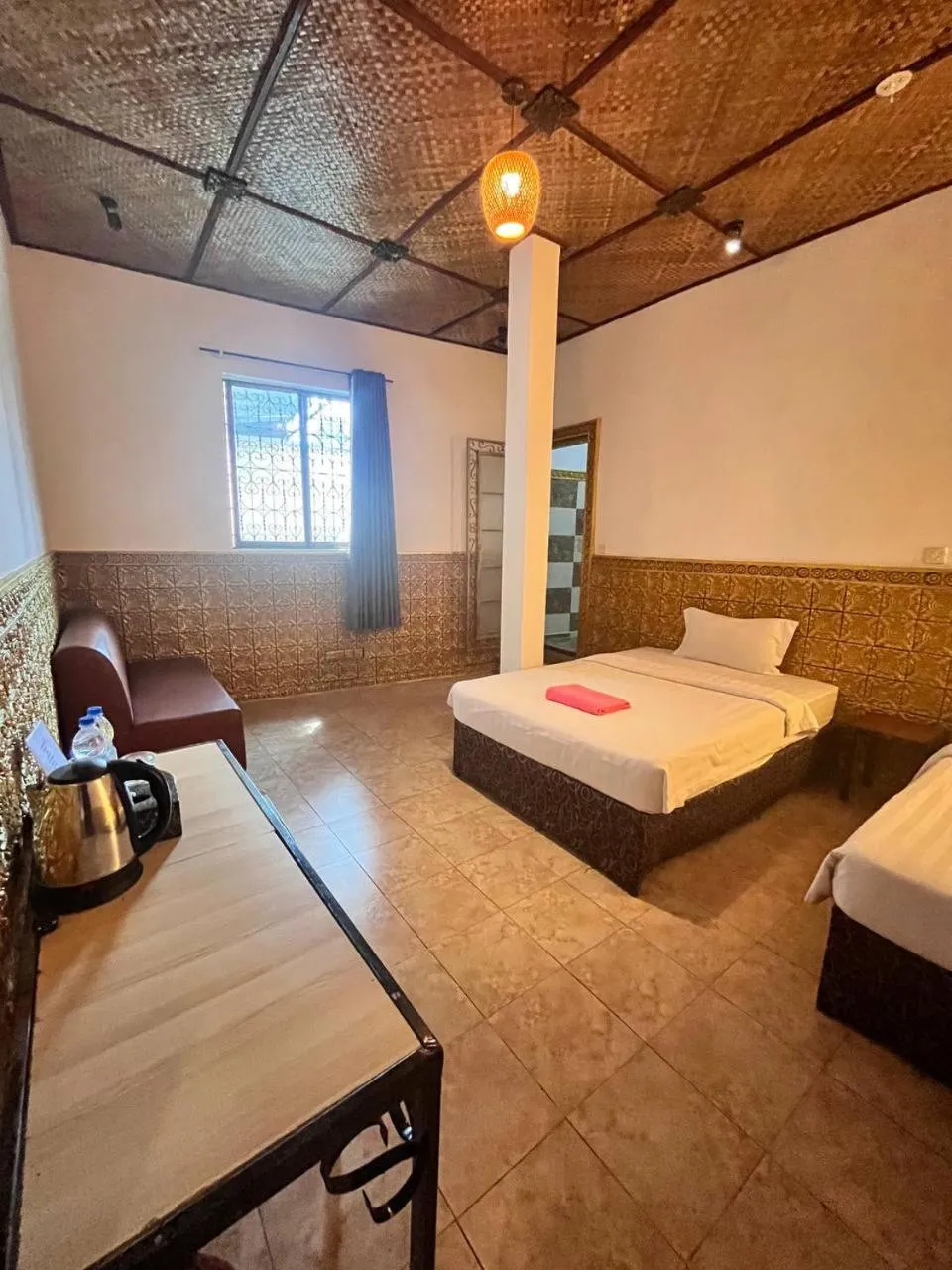 Bed in Le Hotel Hotel Phnom Penh