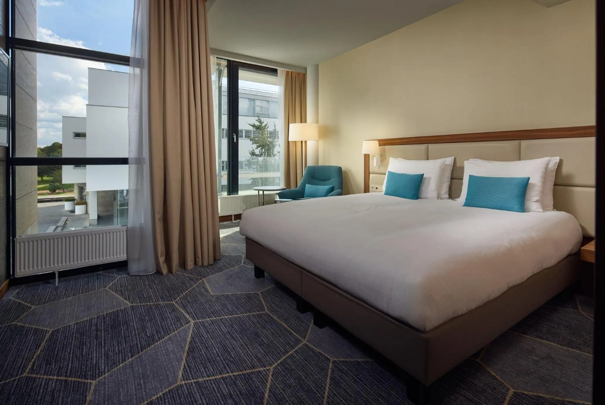 Bedroom, Bed in Crowne Plaza Maastricht by IHG