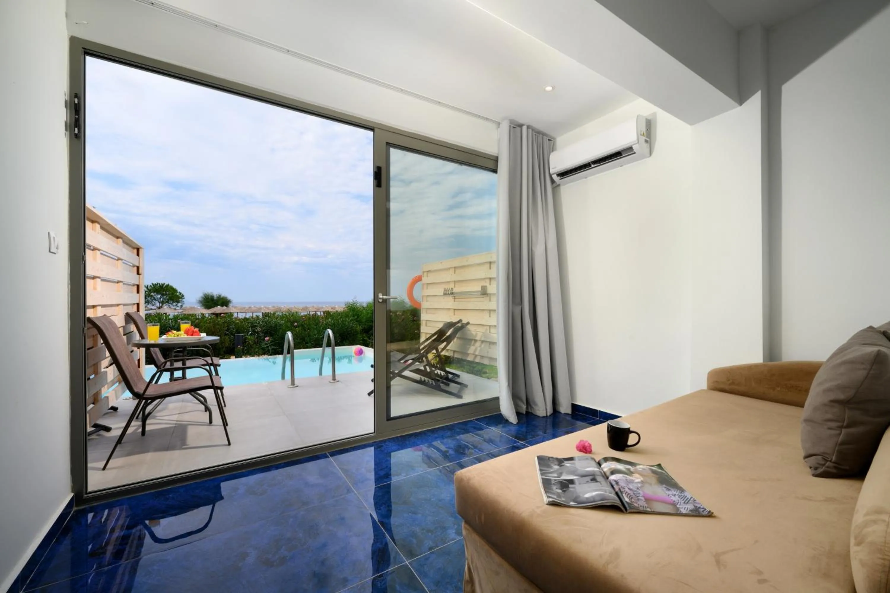 Living room in Ninos Grand Beach Resort