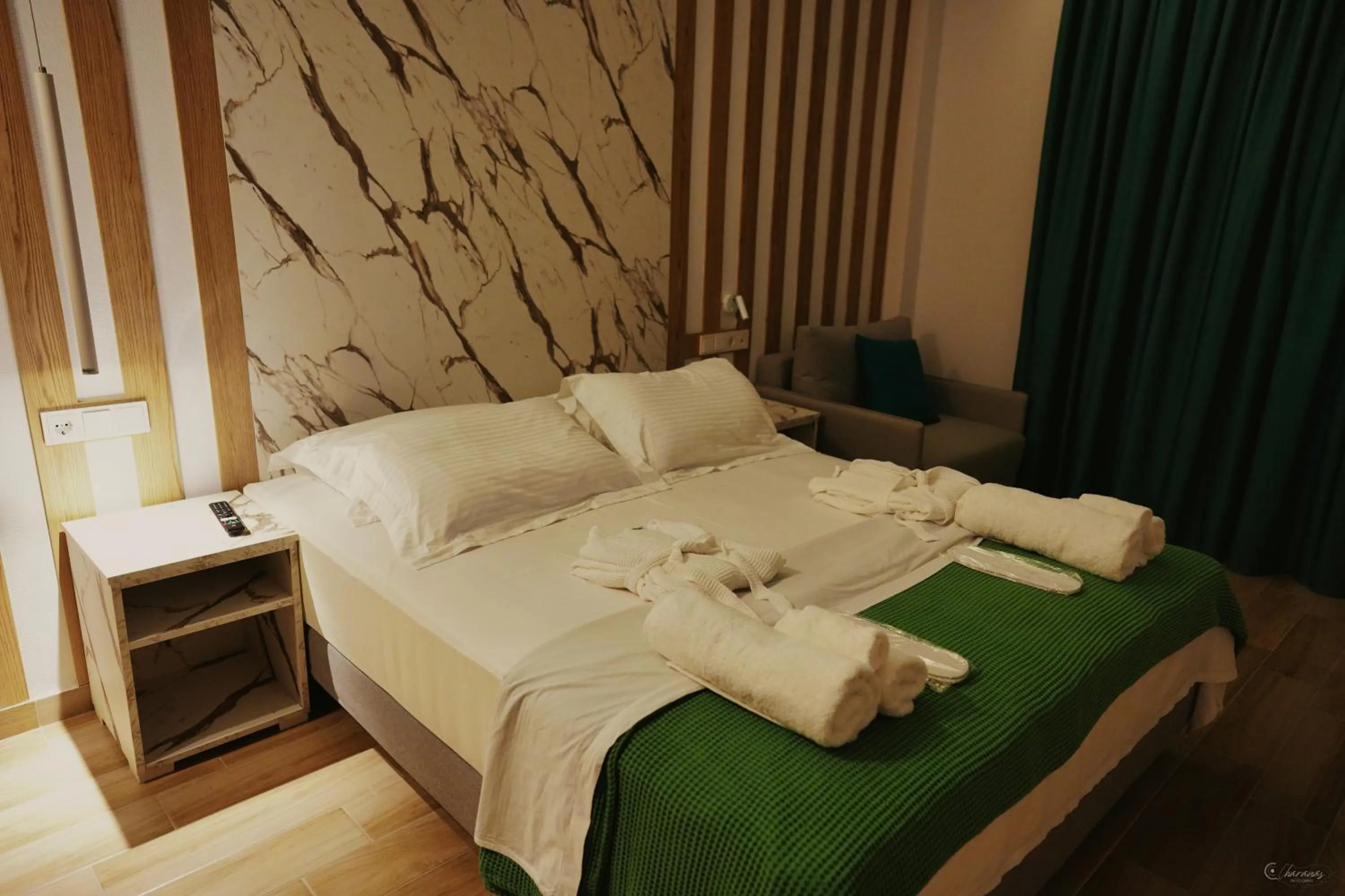 Bed in Electra Suites