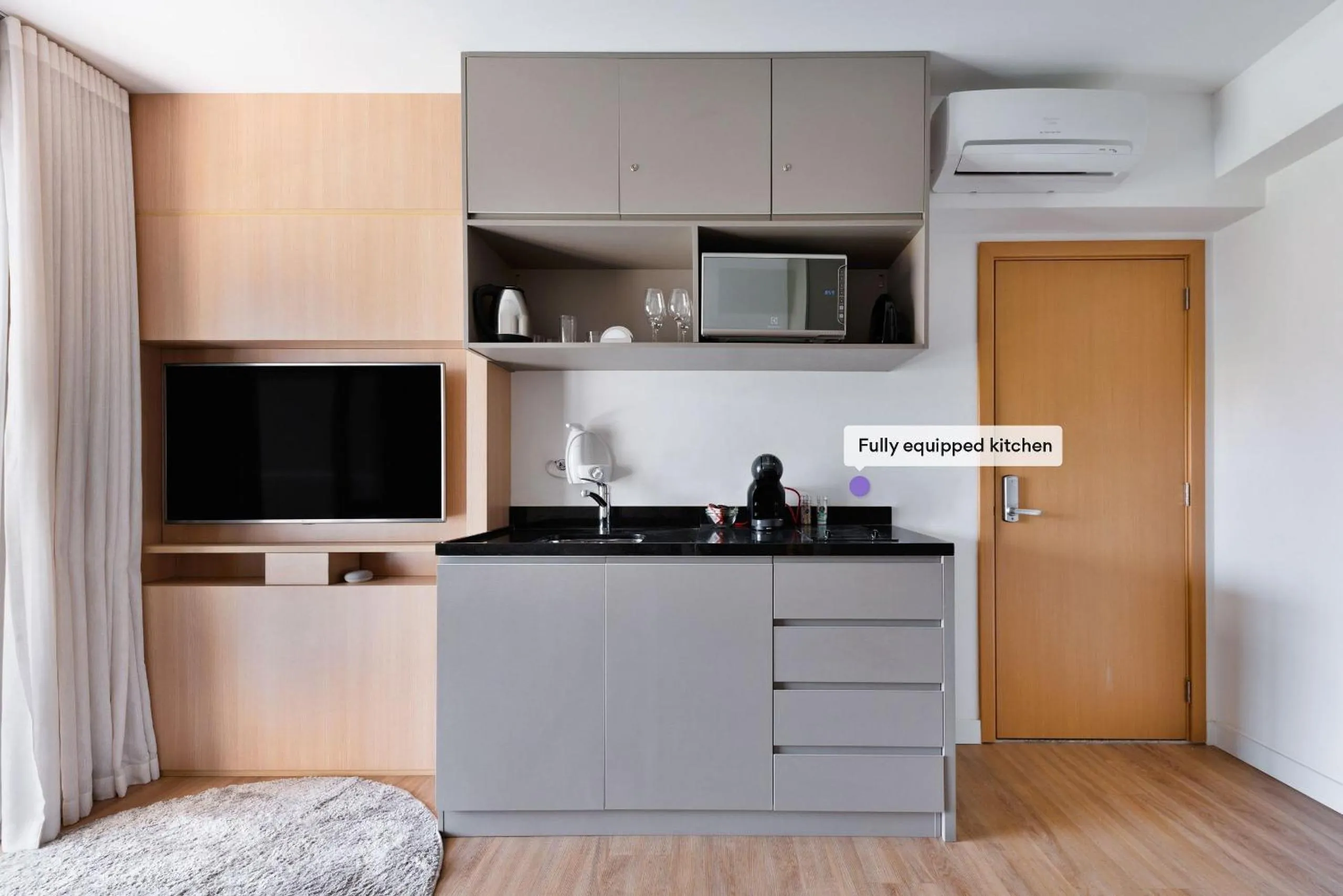 Kitchen or kitchenette in Homelike by Viva - Apartamentos completos em Pinheiros a uma quadra da Faria Lima