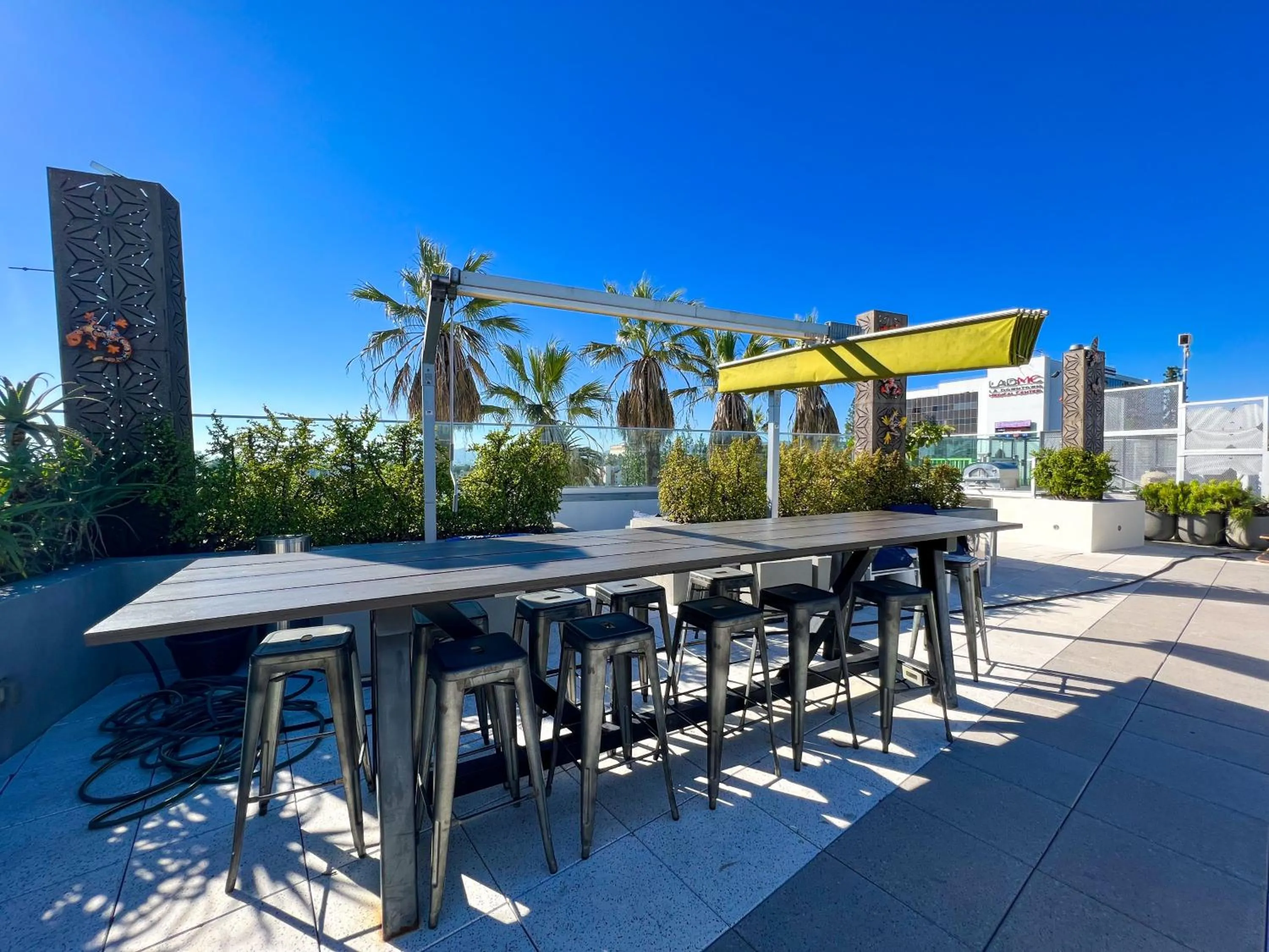 Communal lounge/ TV room in Downtown Los Angeles Skyline balcony view Modern Penthouse
