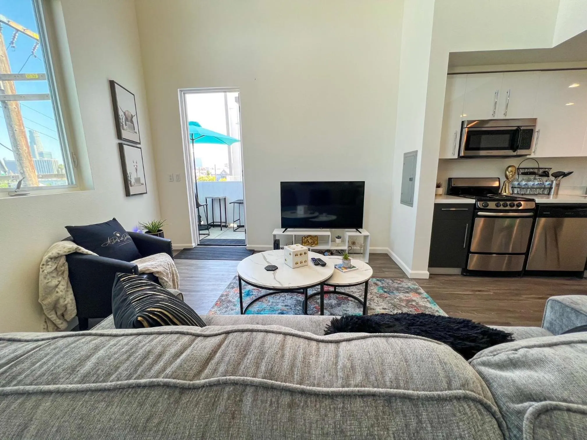 TV and multimedia in Downtown Los Angeles Skyline balcony view Modern Penthouse