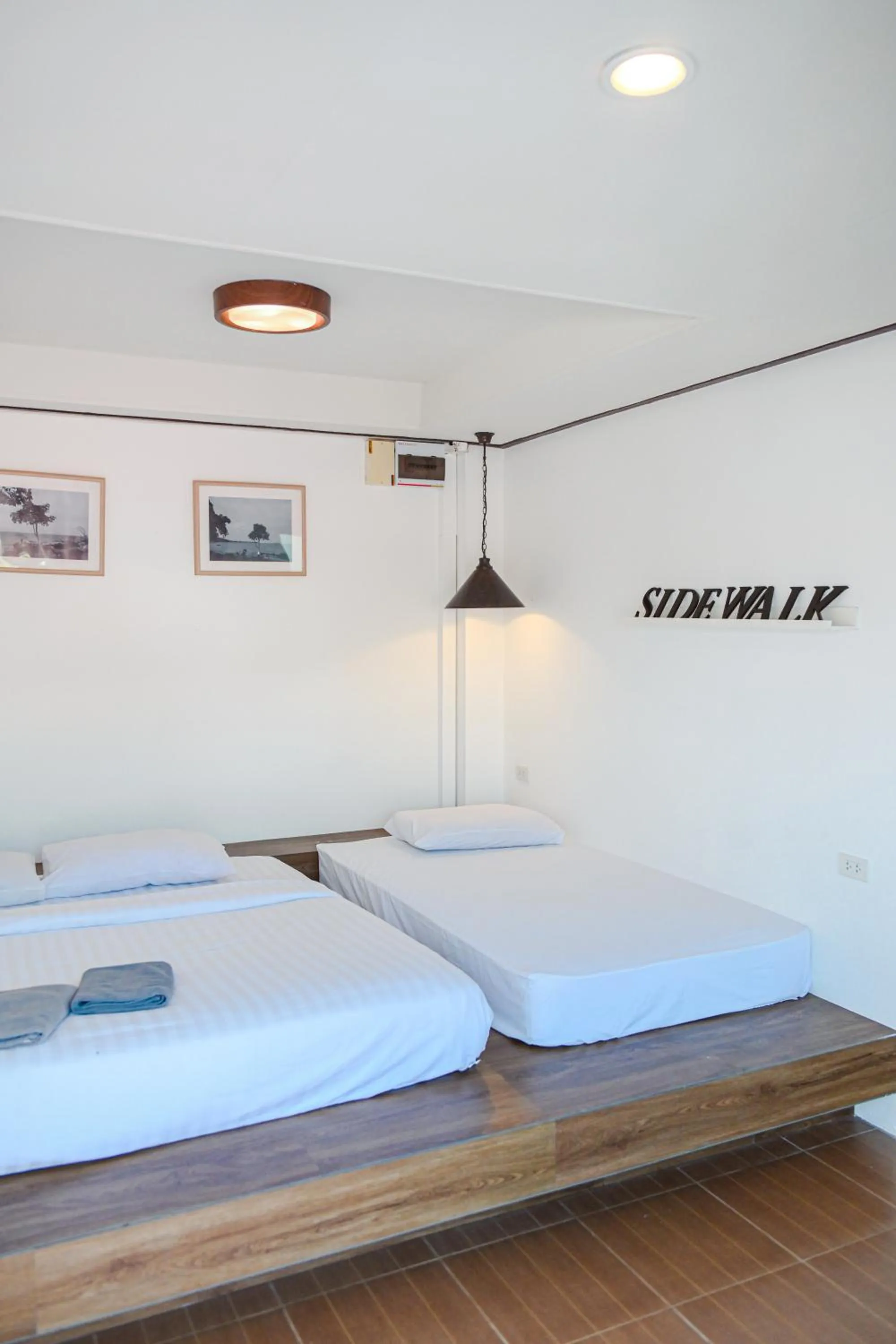 Bed in Sidewalk Boutique Hotel