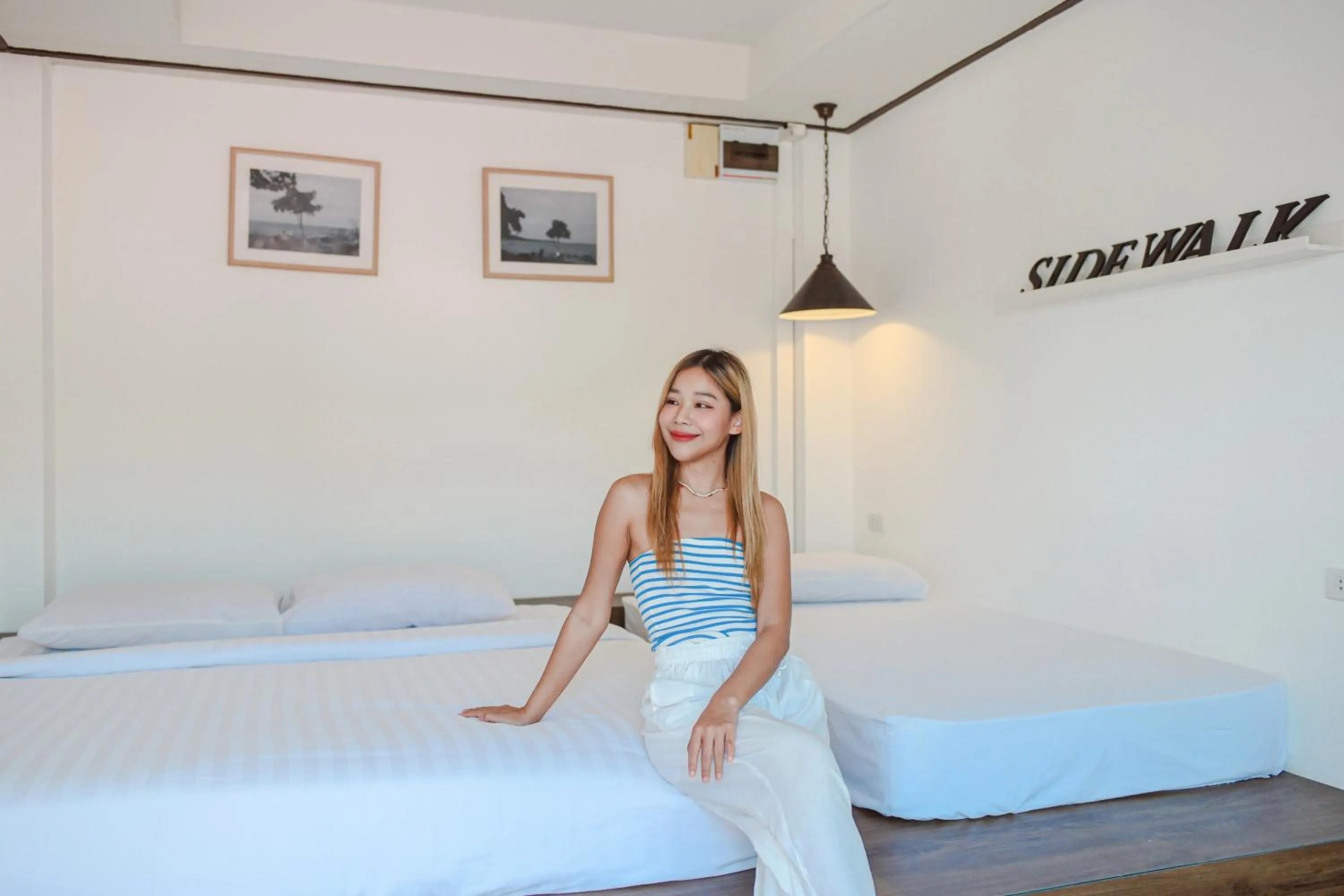 Bed in Sidewalk Boutique Hotel