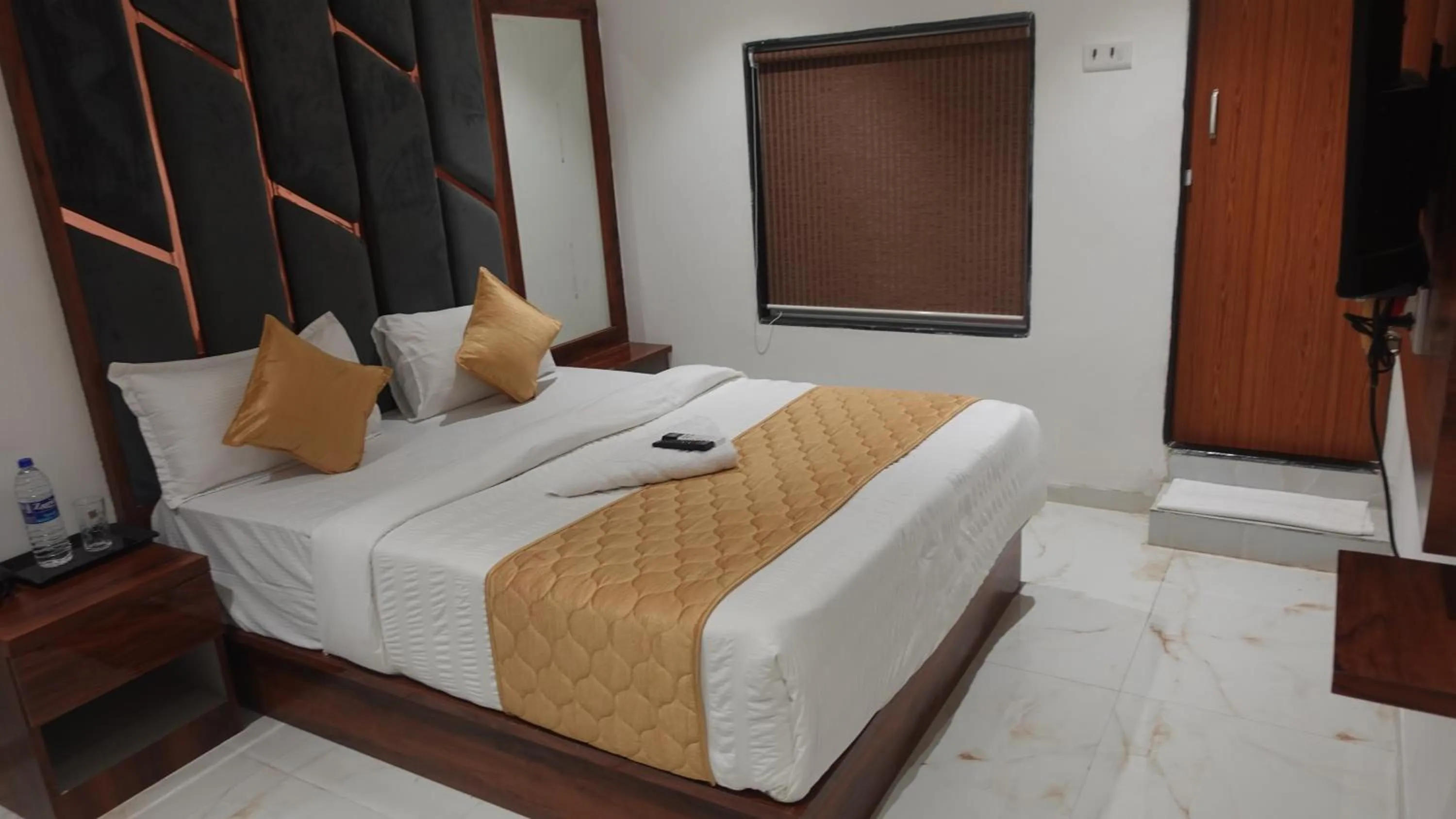 Photo of the whole room, Bed in Hotel Palms Residency, Chembur Mumbai