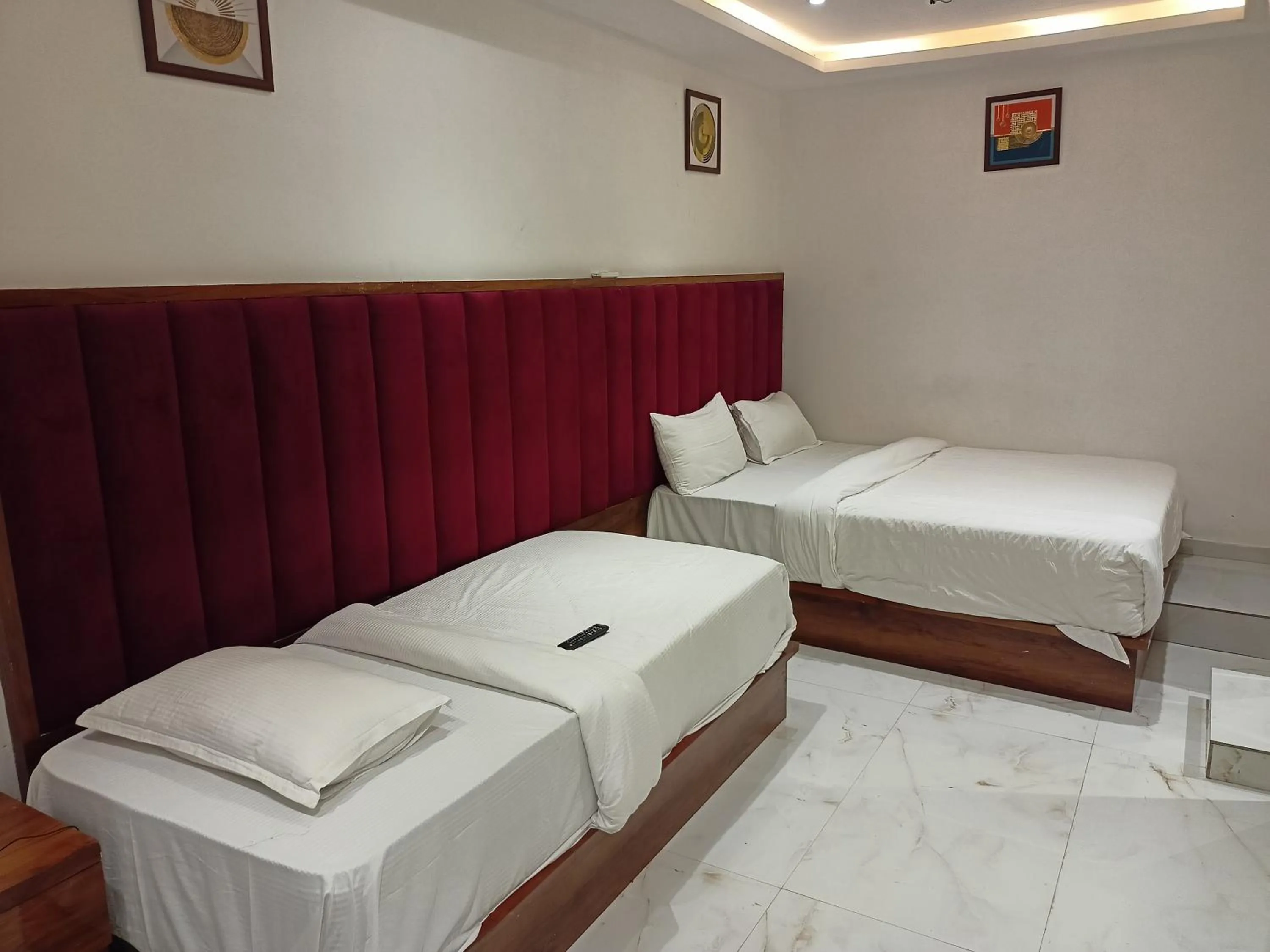 Photo of the whole room, Bed in Hotel Palms Residency, Chembur Mumbai
