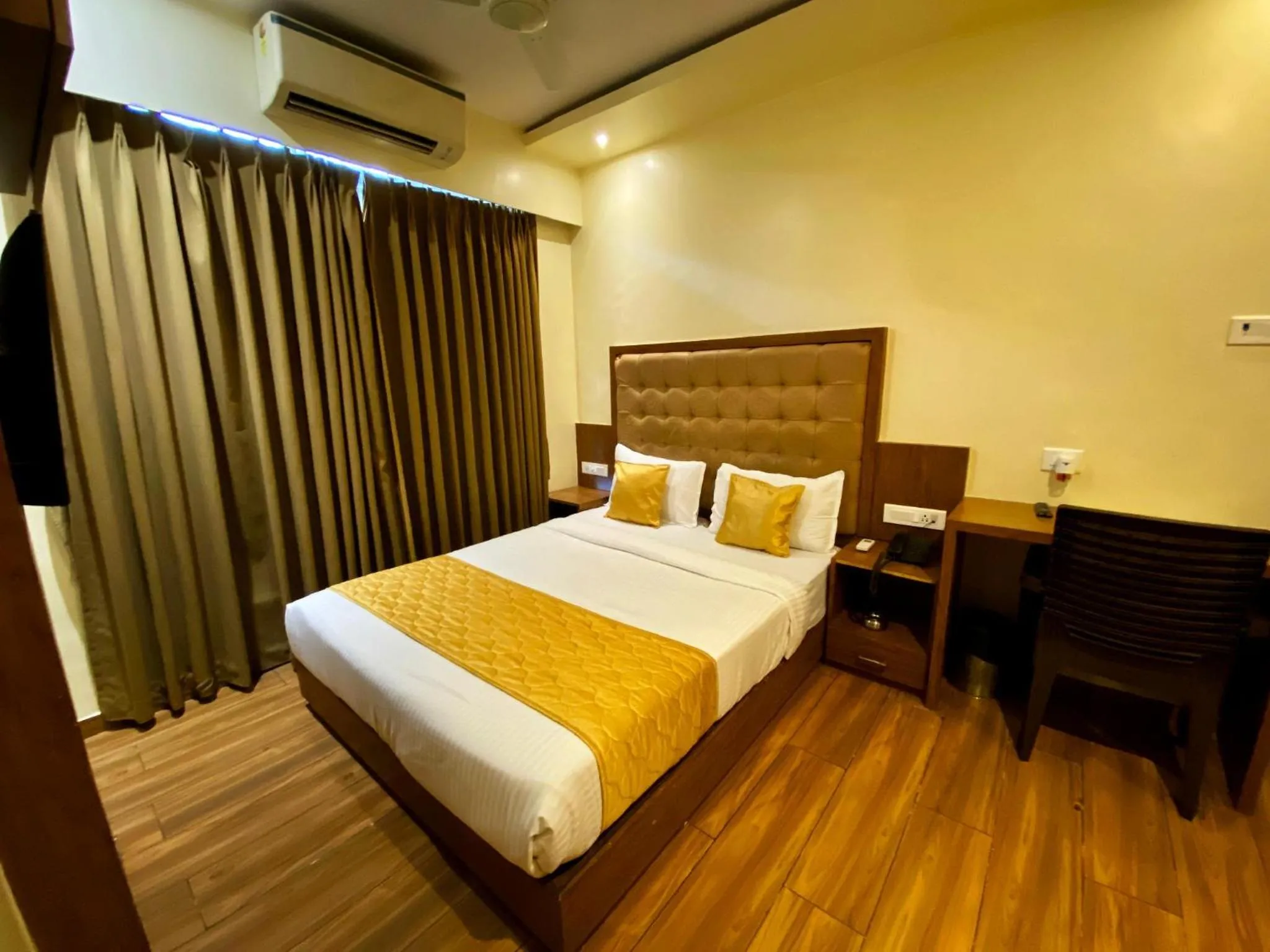 Photo of the whole room, Bed in Hotel Palms Residency, Chembur Mumbai