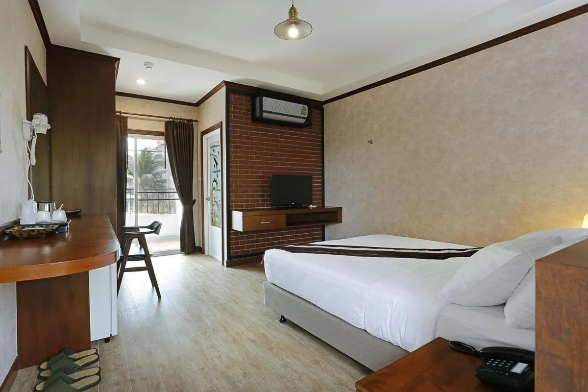Bed in RoomQuest Chonburi Laem Chabang