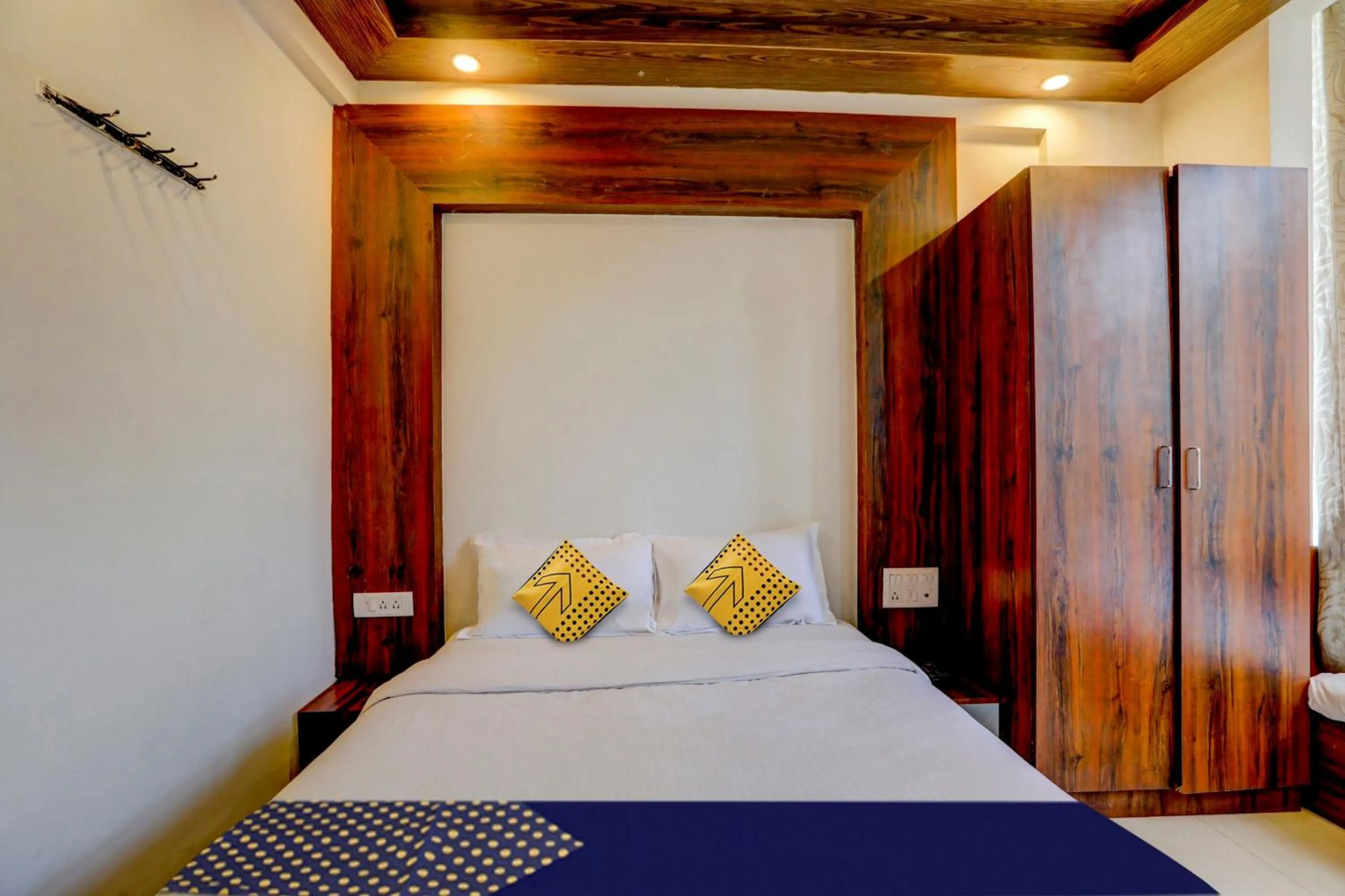 Bedroom in Hotel O Rajdhani Group Of Hotels