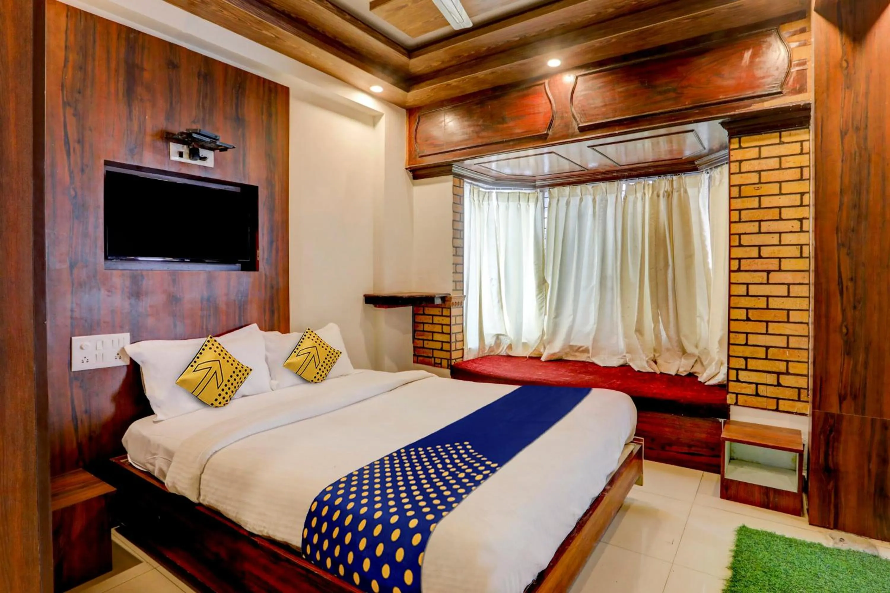 Bedroom in Hotel O Rajdhani Group Of Hotels
