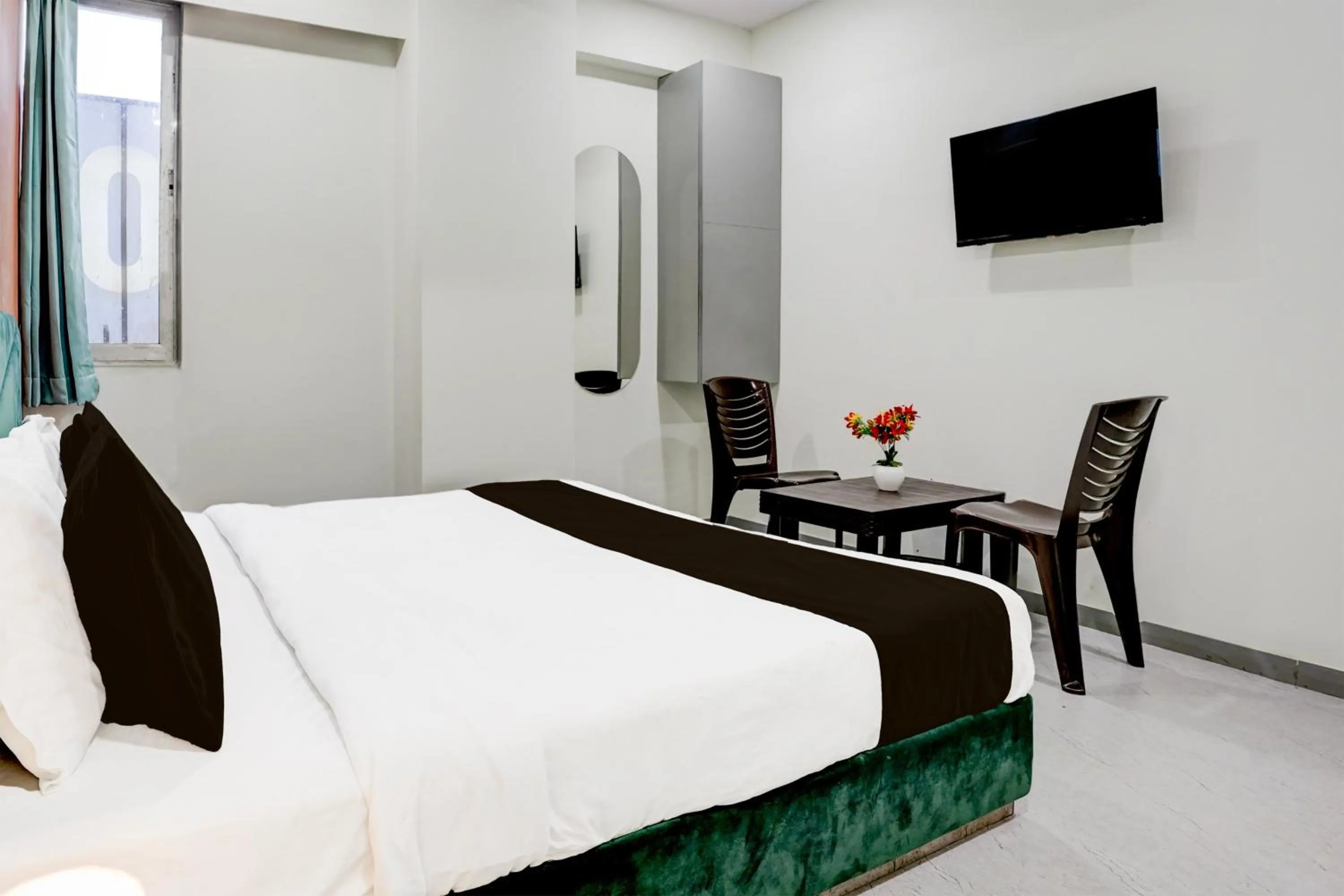 Classic Triple Room - single occupancy in Collection O Adajan Formerly Hotel Sky Palace