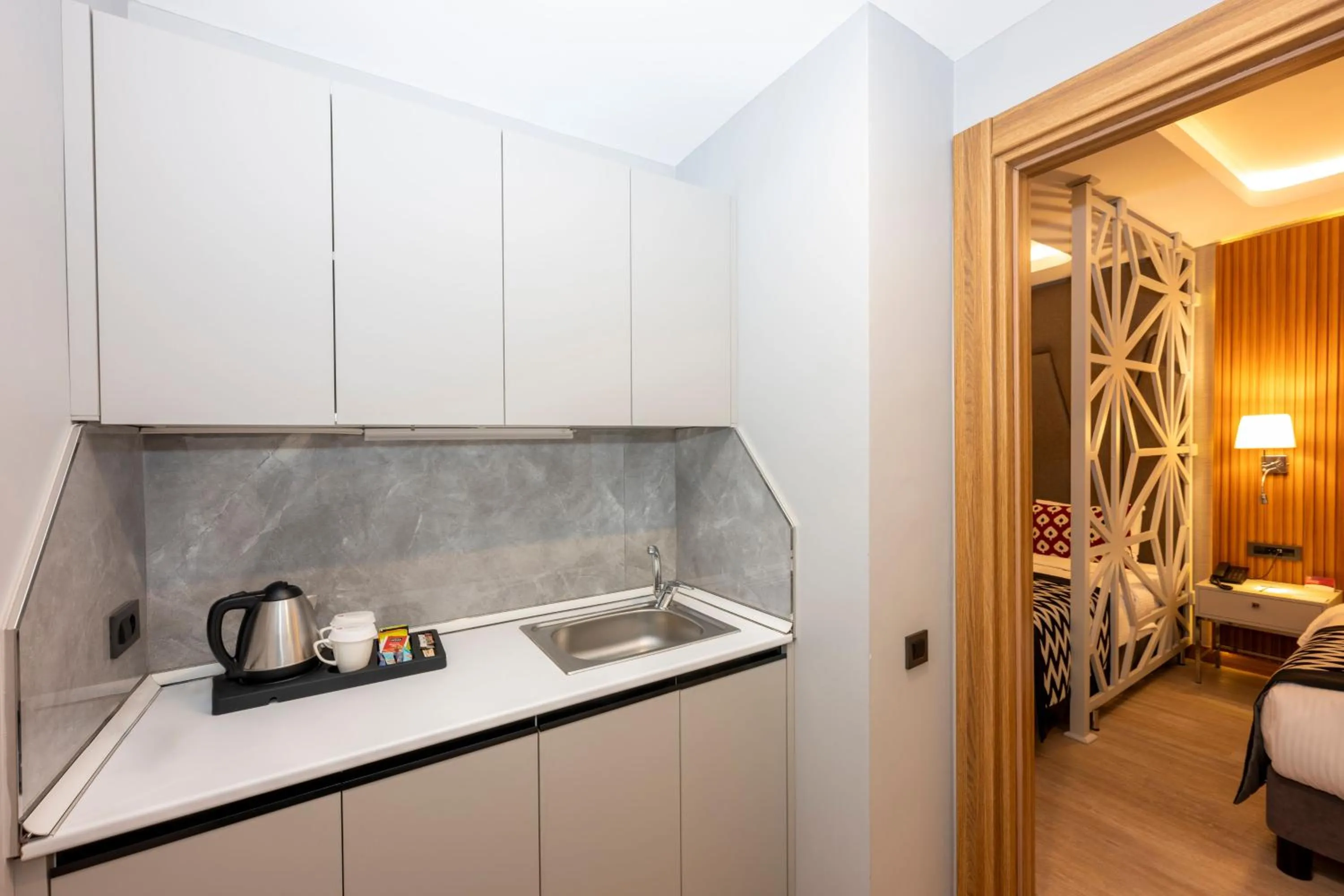 Coffee/tea facilities, Bed in Ramada Encore by Wyndham Istanbul Sisli