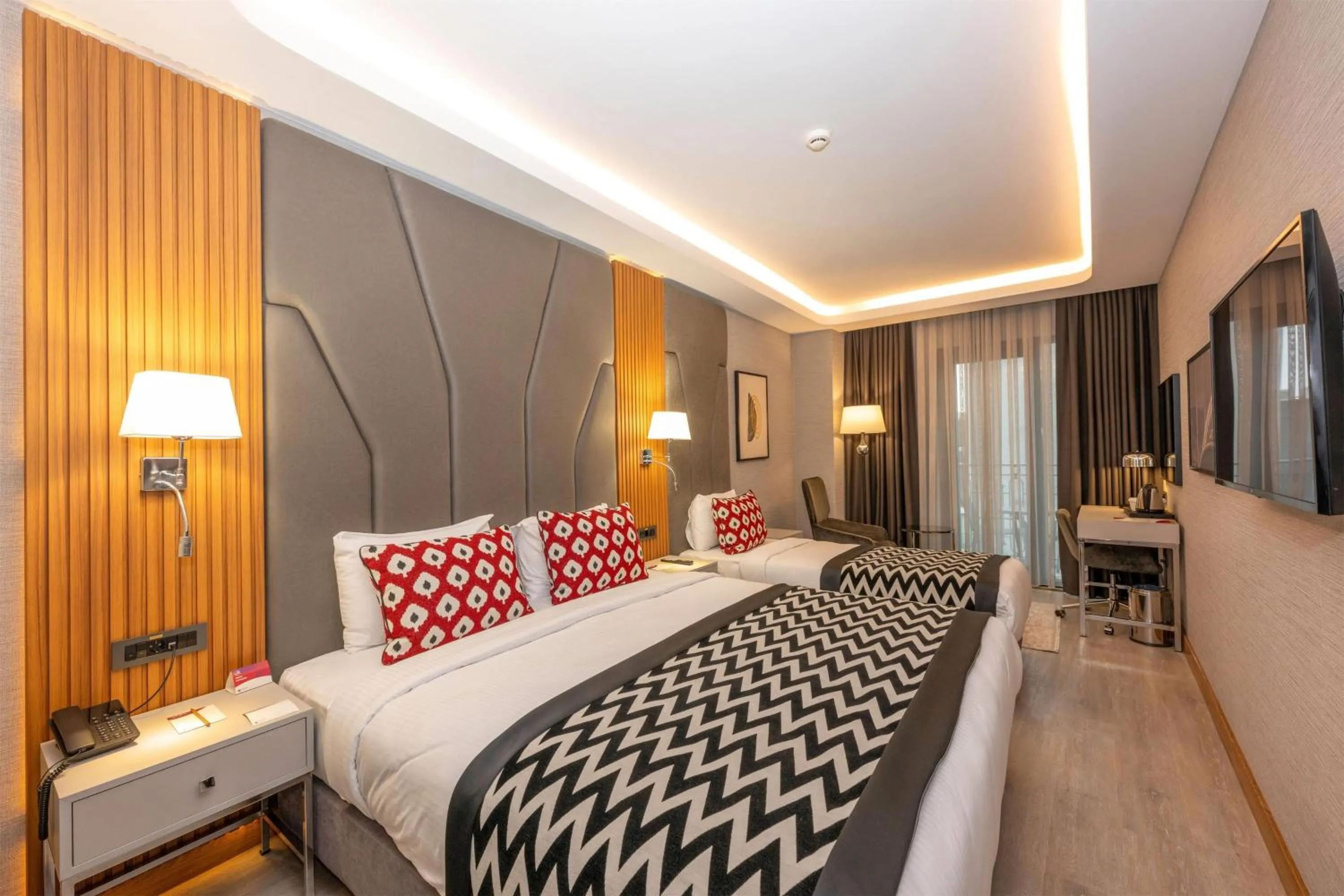 Photo of the whole room, Bed in Ramada Encore by Wyndham Istanbul Sisli