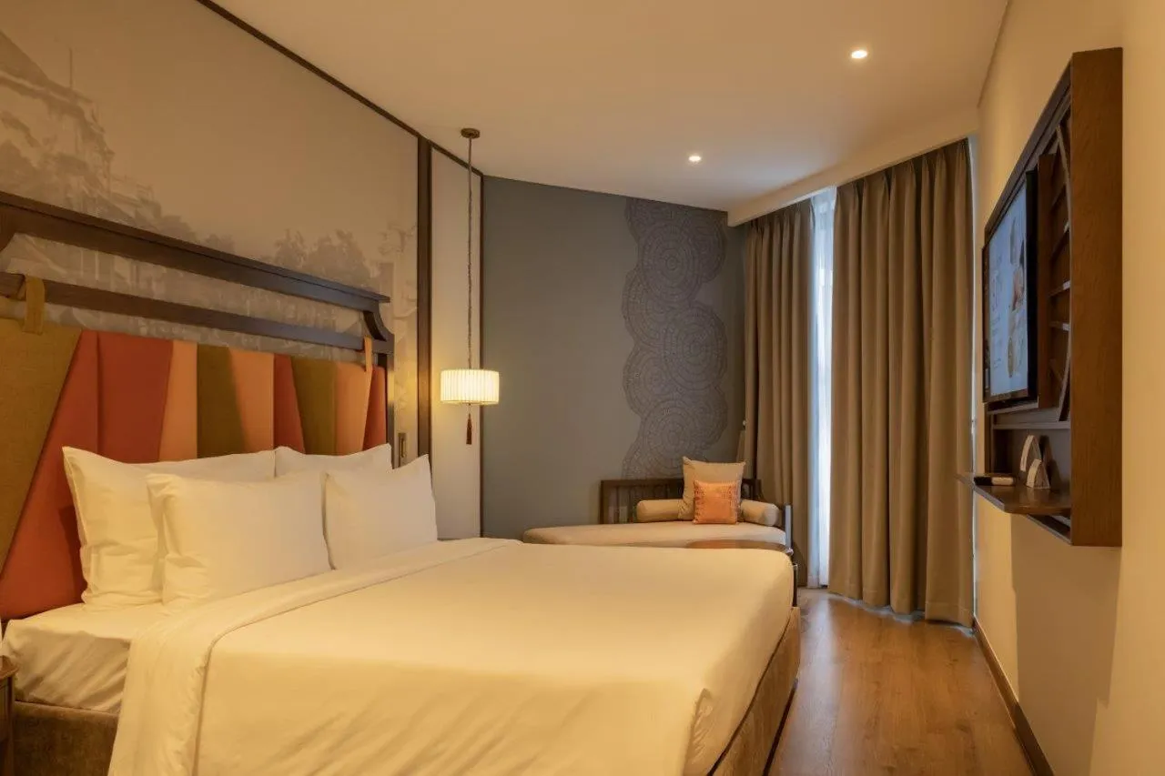 Photo of the whole room, Bed in M Continental by Mandala Mui Ne