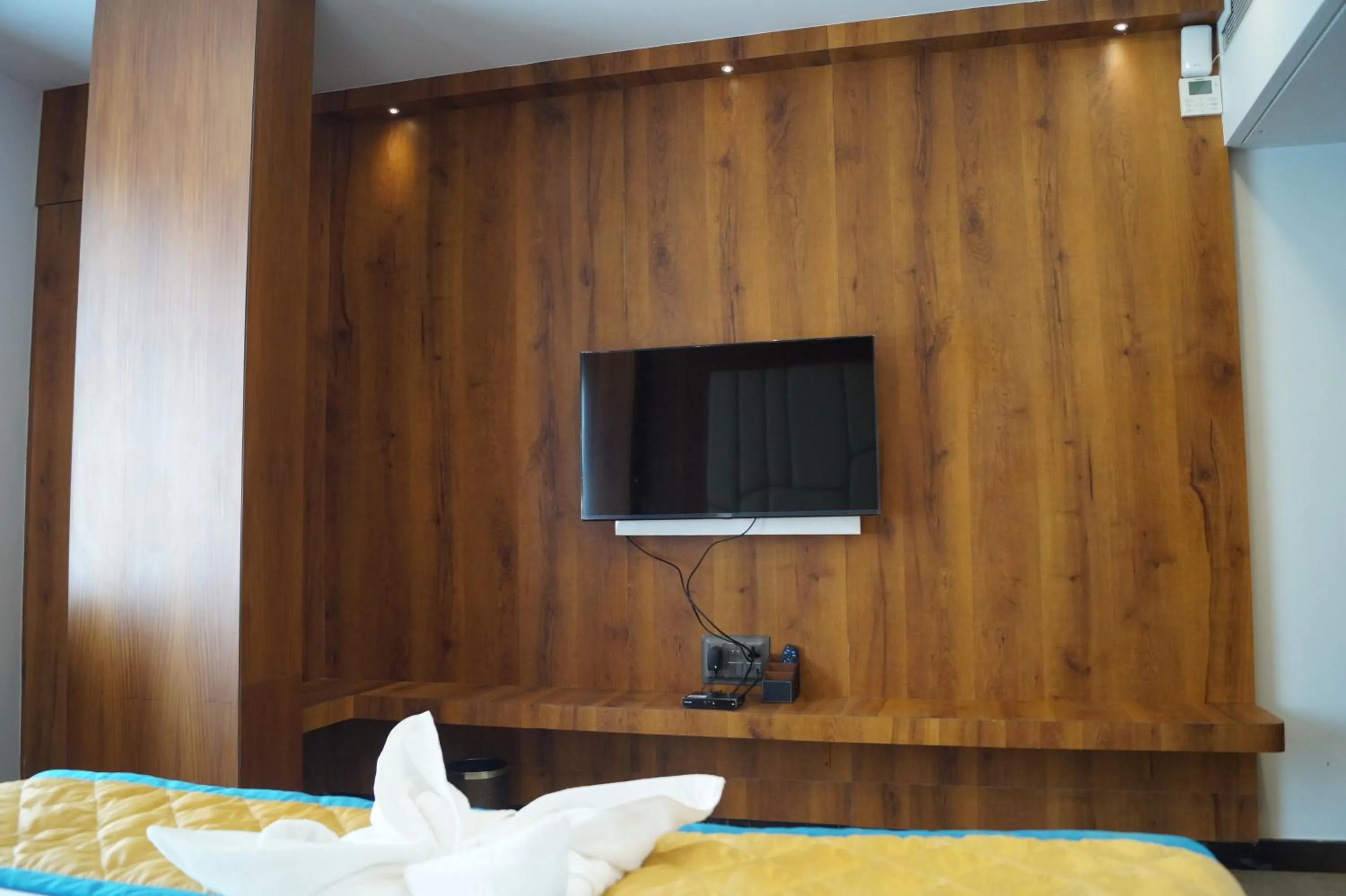 Bed in Hotel Varun Mansion Hassan