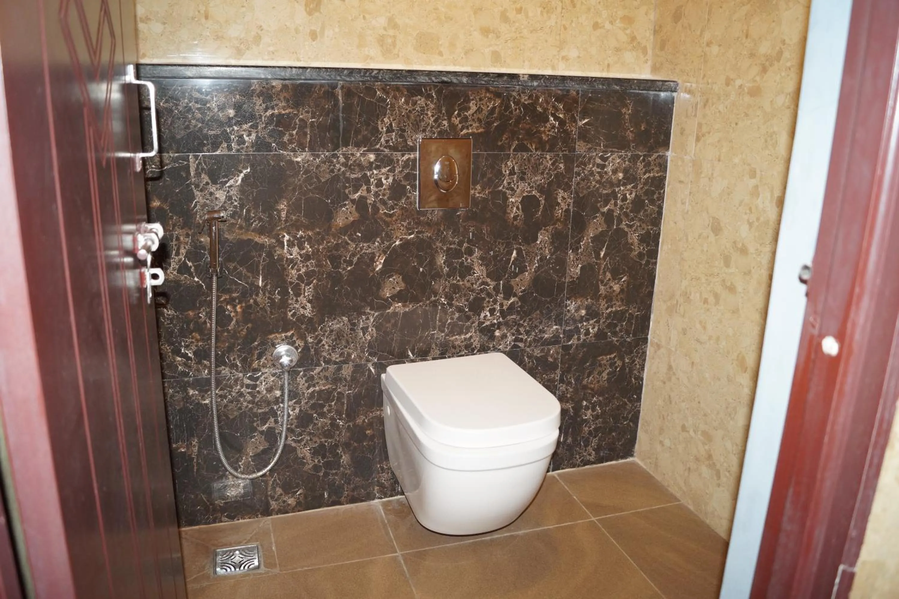 Bathroom in Hotel Varun Mansion Hassan