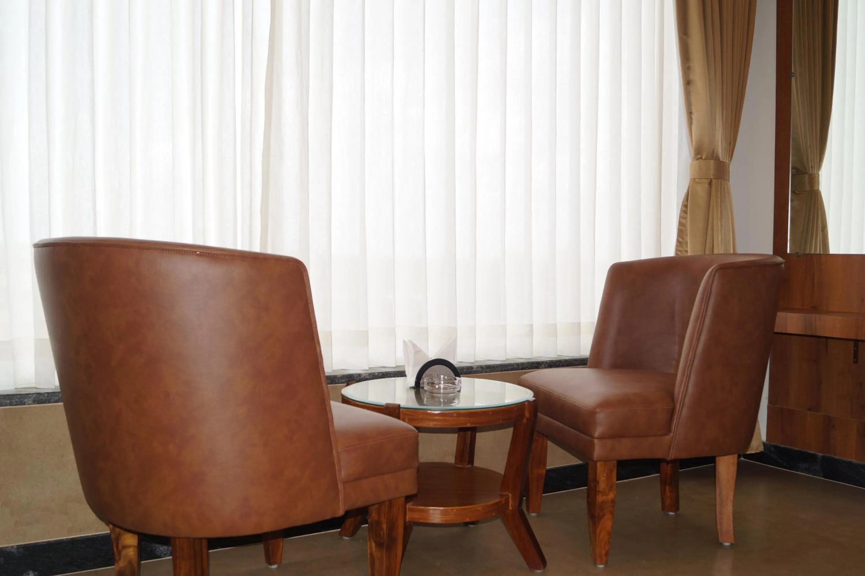 Living room in Hotel Varun Mansion Hassan