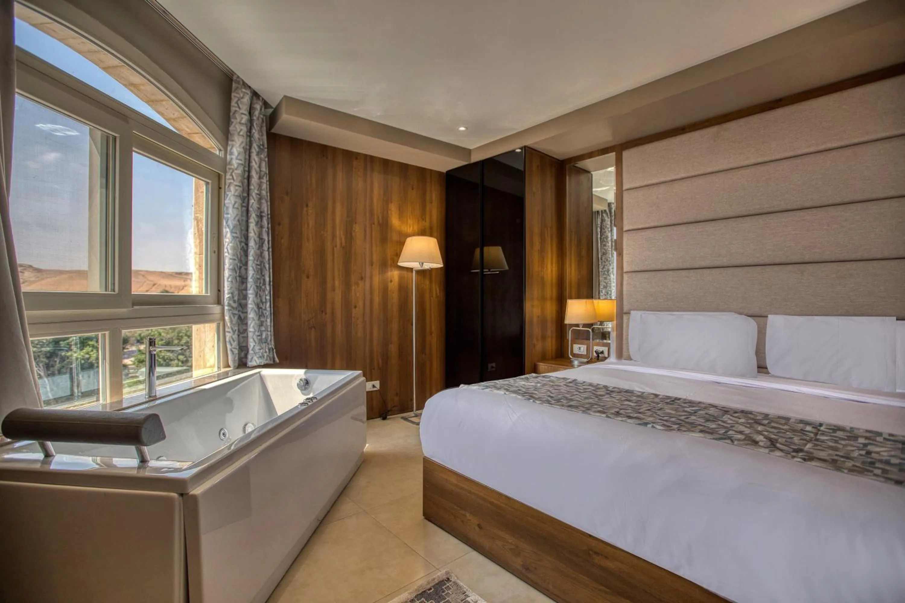 Bed in Nozol Pyramids Hotel and Spa