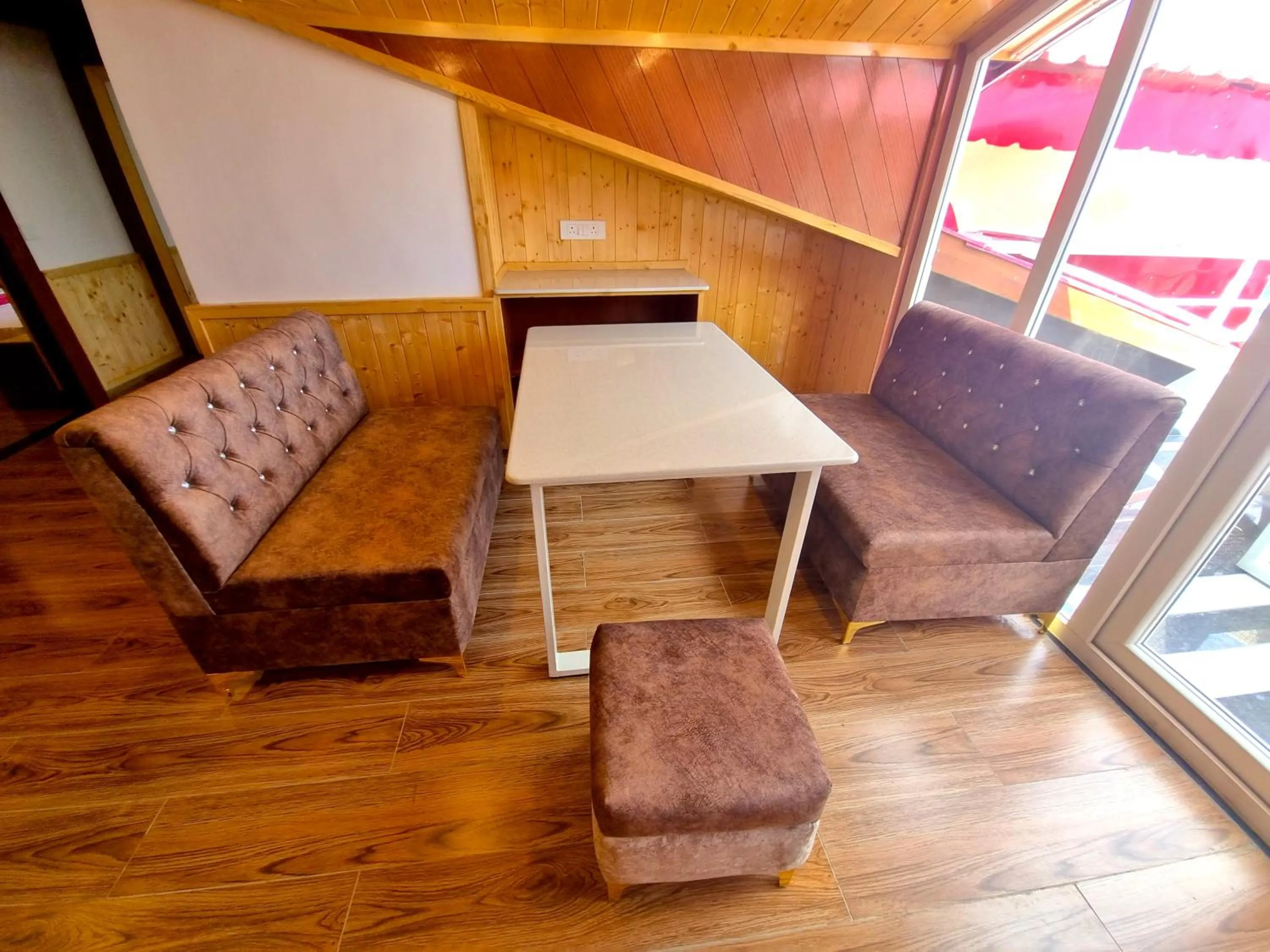 Seating area in Hotel Wood Stock Luxury - A Boutique Property - Penthouse - Open Air Restaurant & Terrace