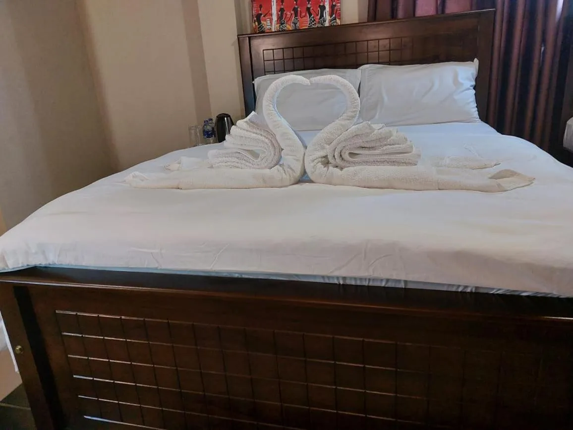 Bed in Edwin's Airport Garden