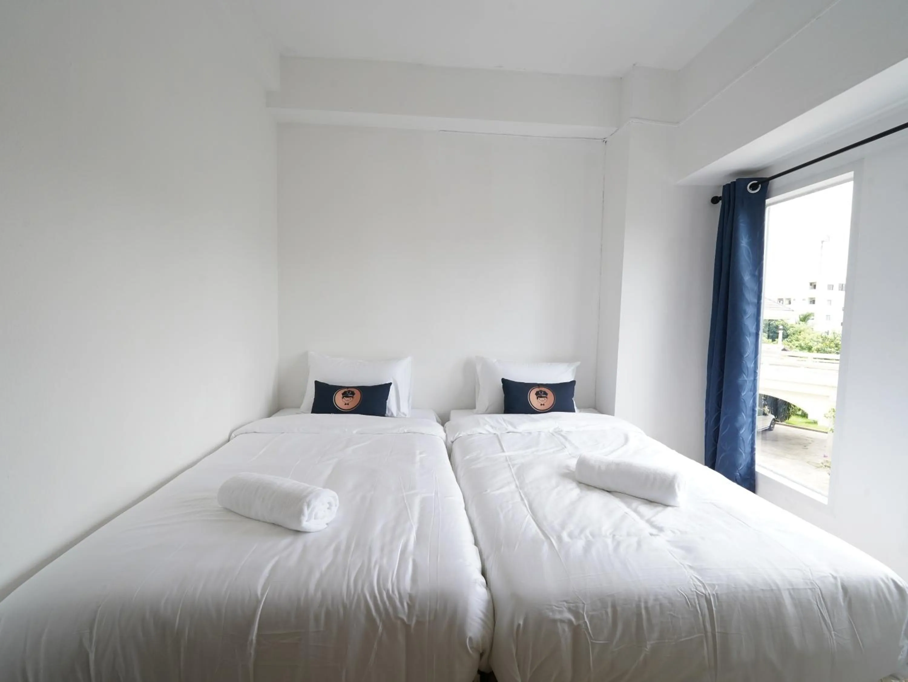 Bed in RoomQuest IT Square Don Mueang Airport