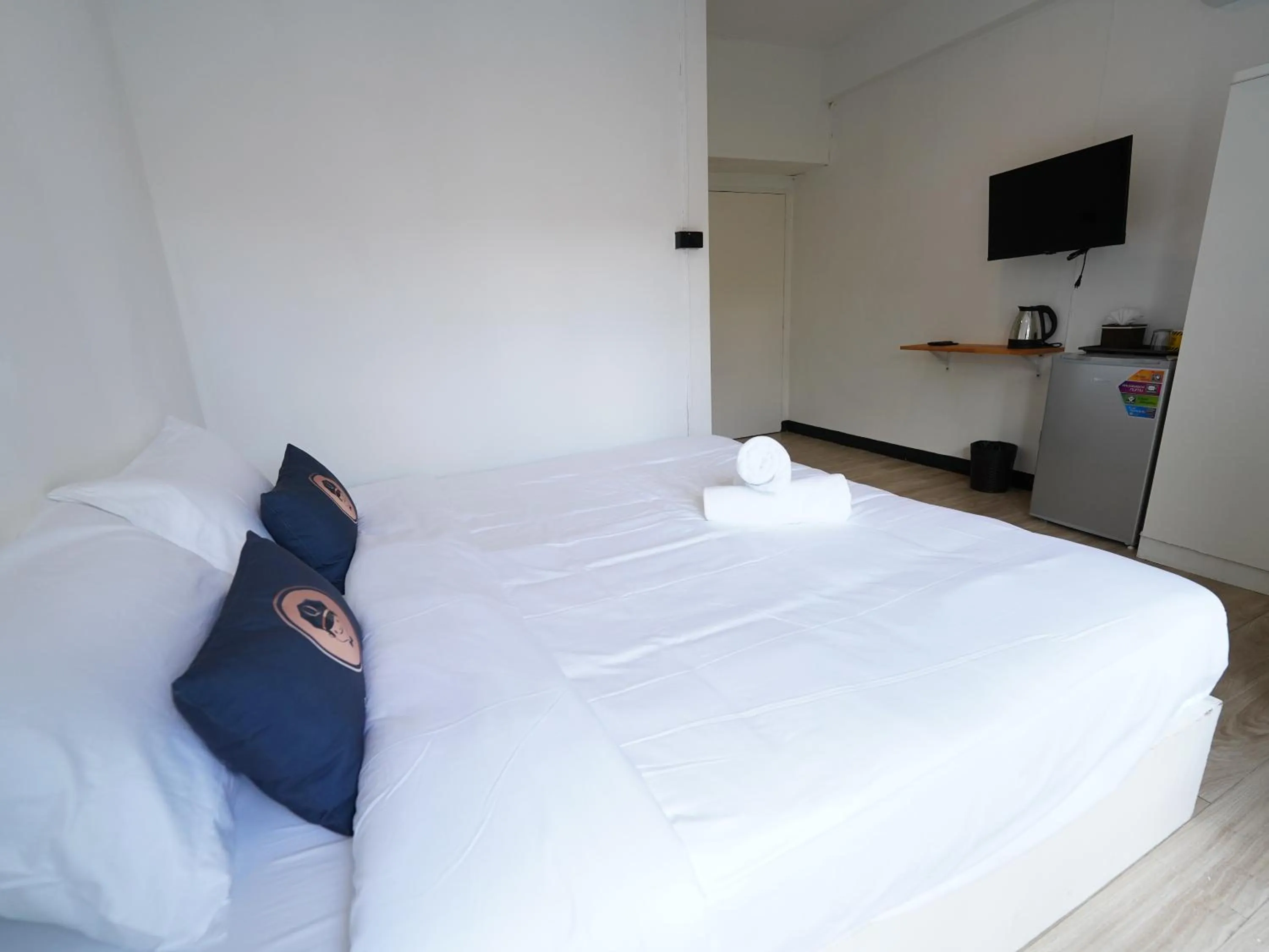 Bed in RoomQuest IT Square Don Mueang Airport