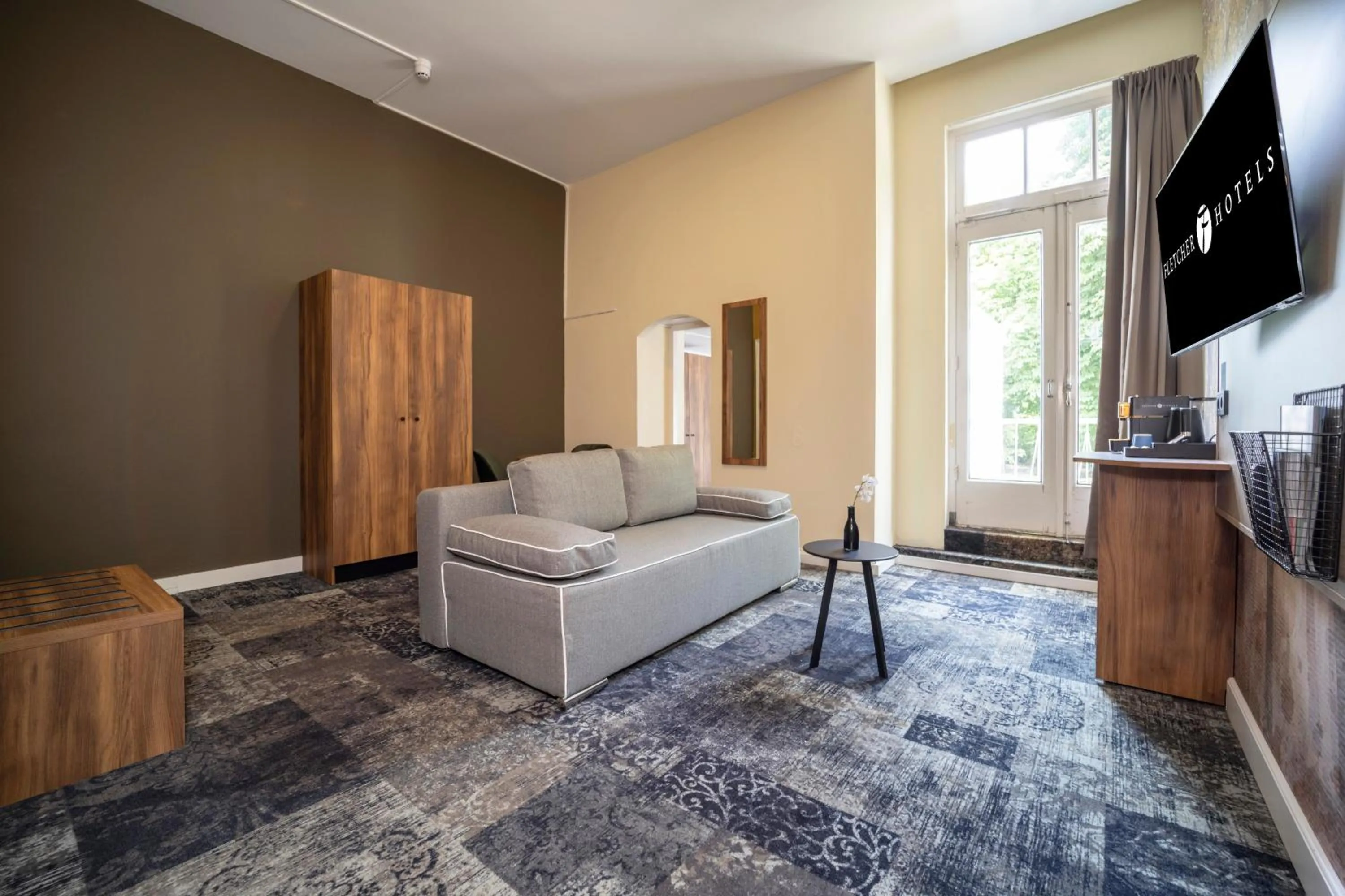 TV and multimedia in Fletcher Hotel Restaurant Erica