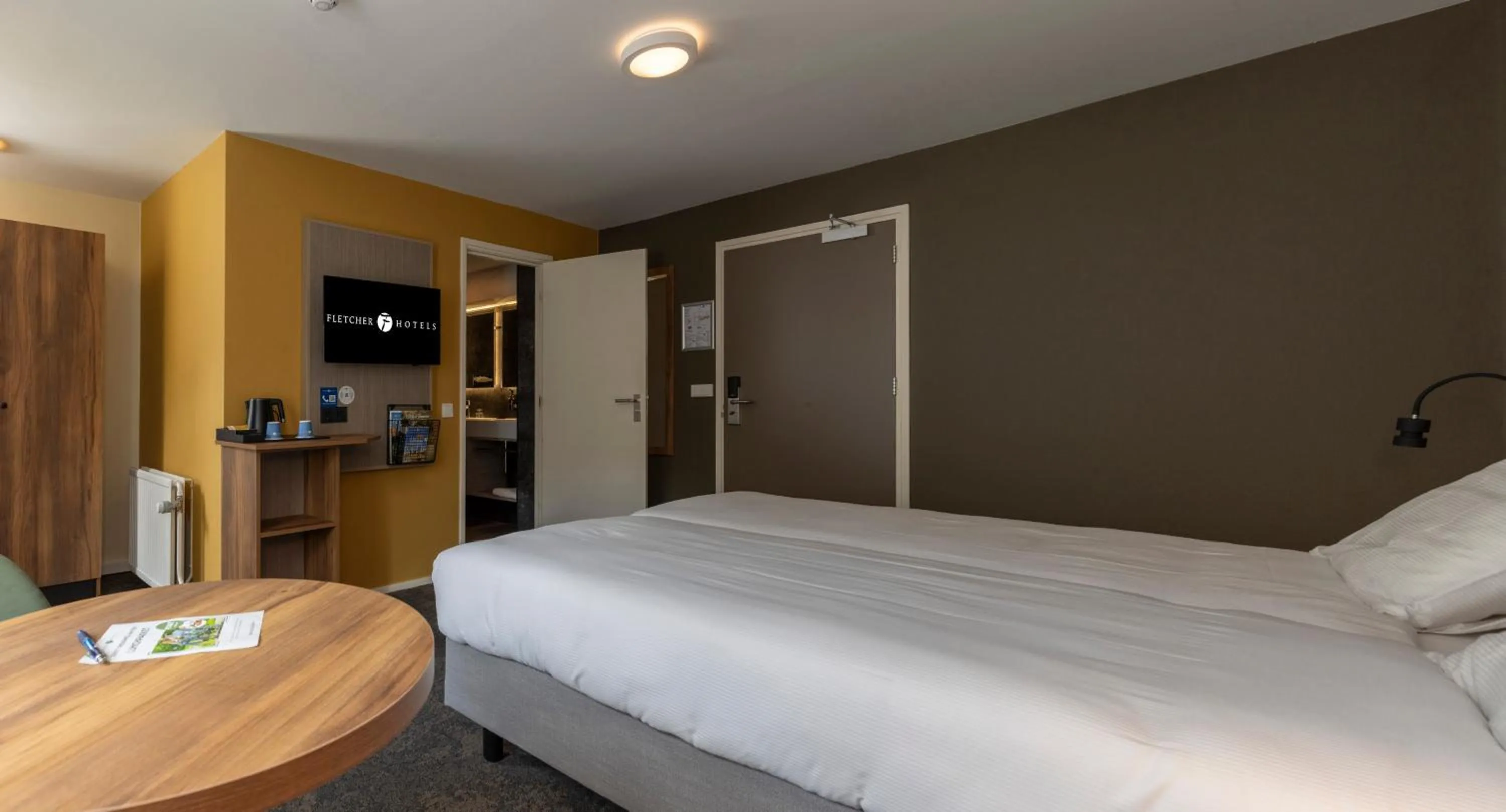 Photo of the whole room, Bed in Fletcher Hotel Restaurant Erica