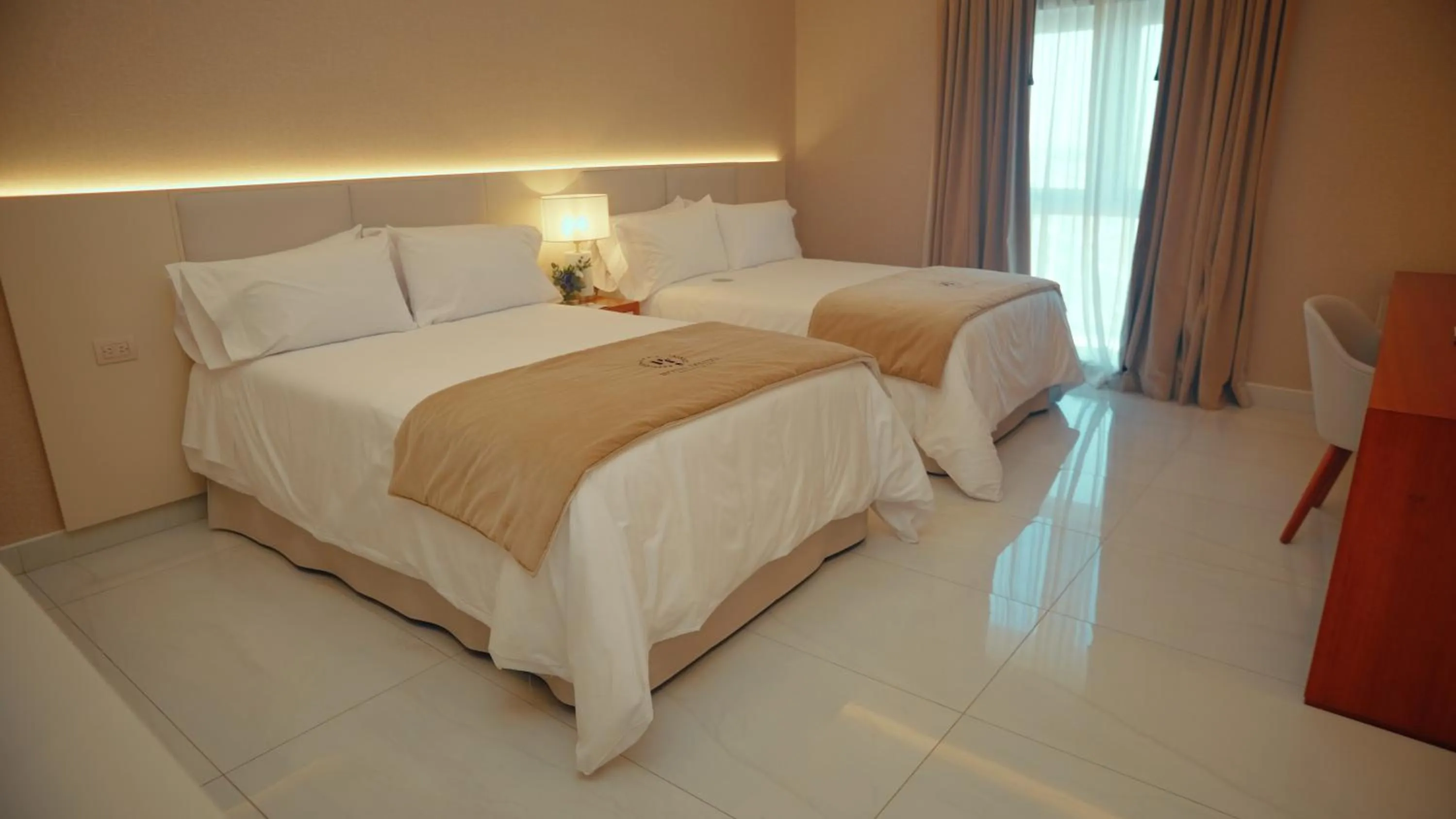 Bedroom in HT Hotel Deluxe Resort & SPA