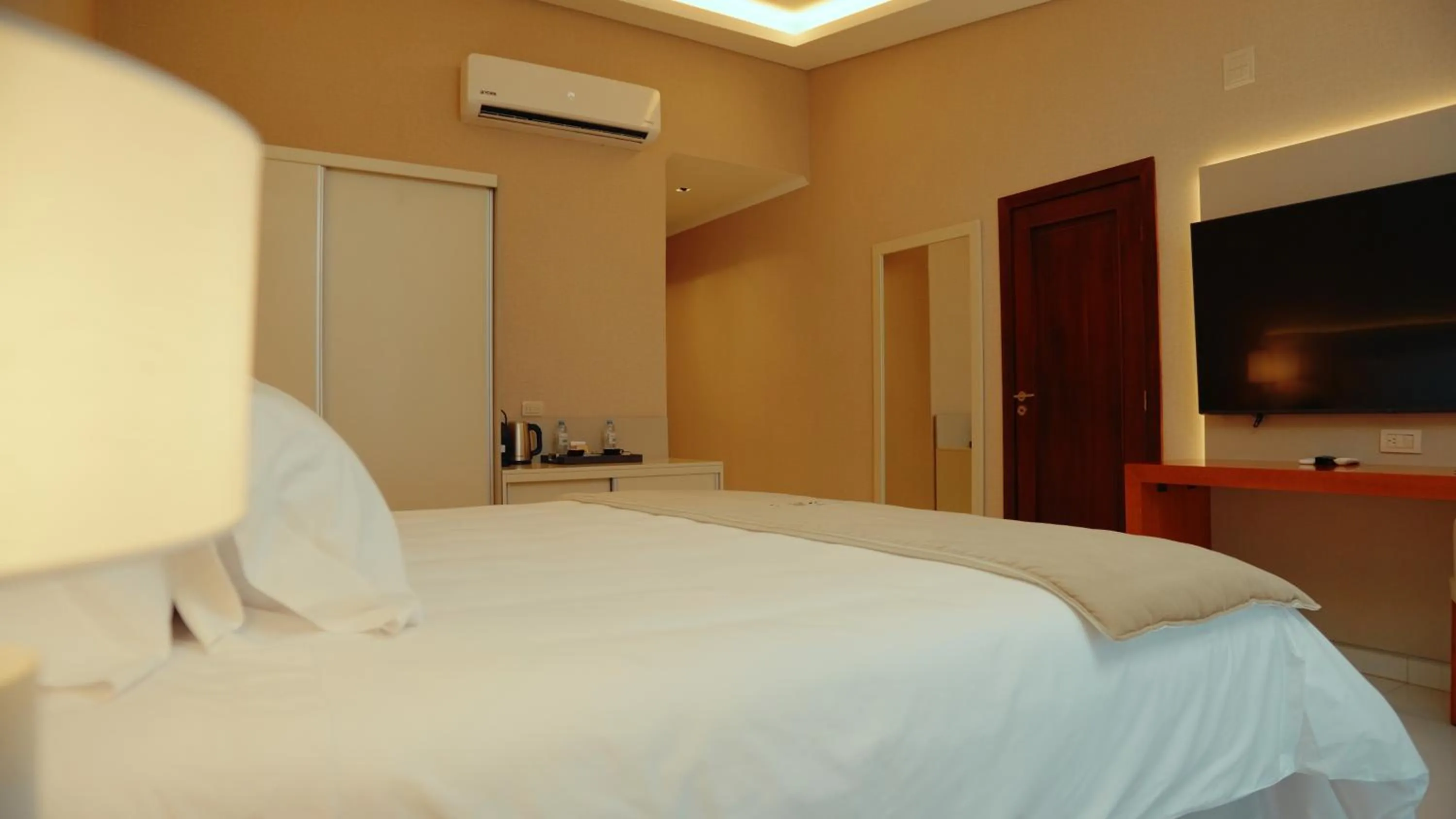 Bedroom in HT Hotel Deluxe Resort & SPA