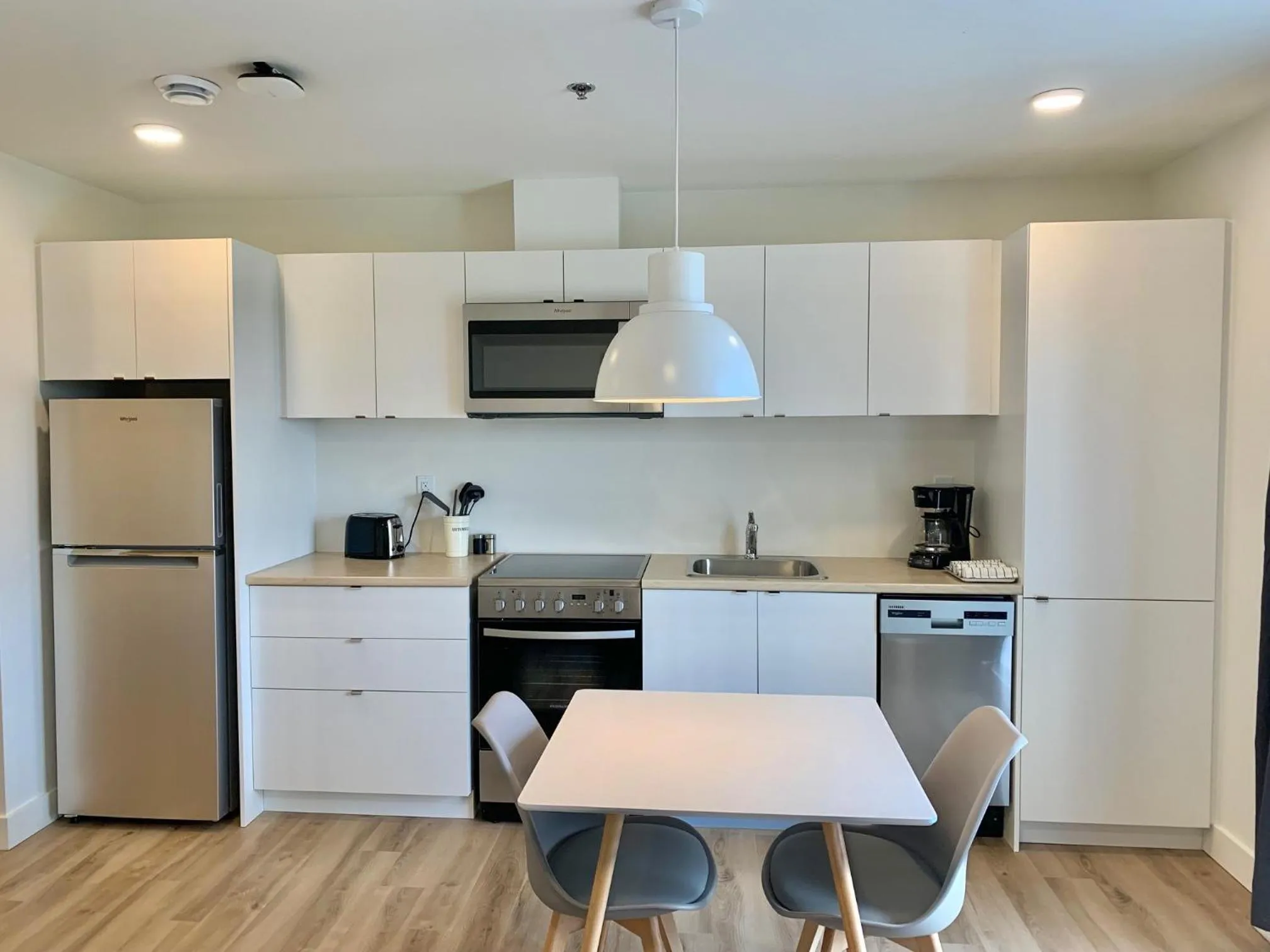 Kitchen or kitchenette in APPART-HOTEL L'UNI