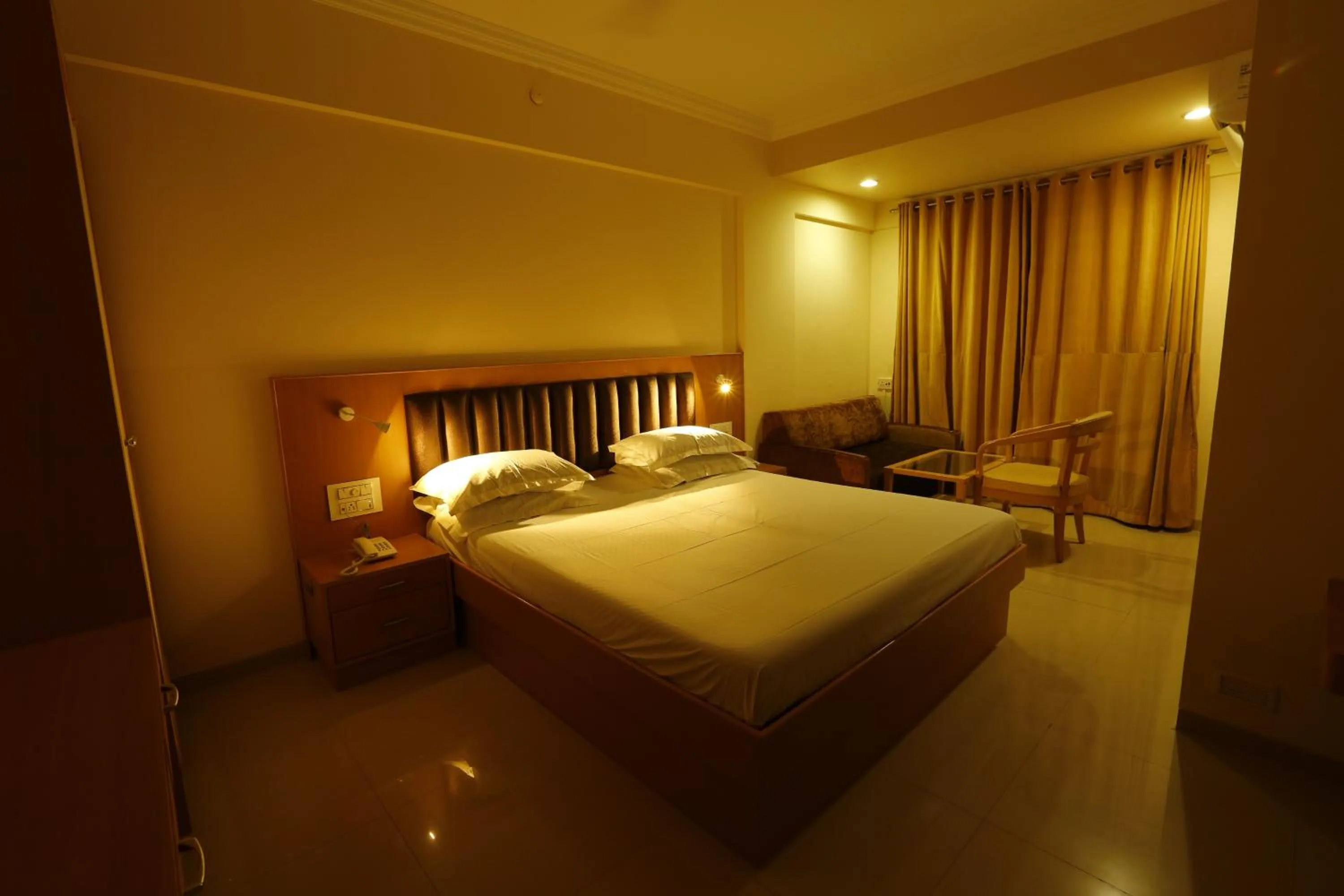 Photo of the whole room, Bed in Hotel Ravikiran Alibaug