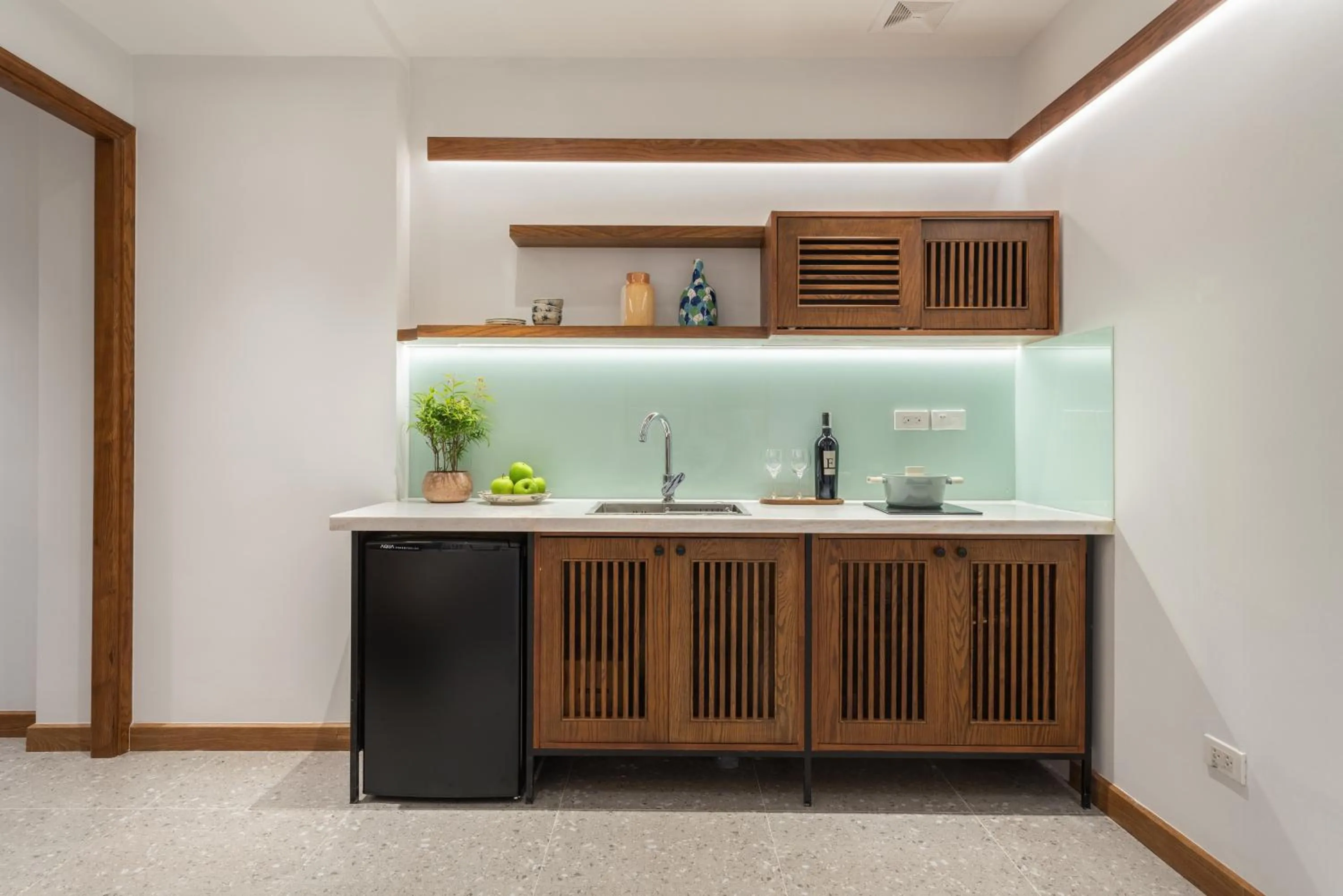 Kitchen or kitchenette in Le Parfum Apartment and Hotel