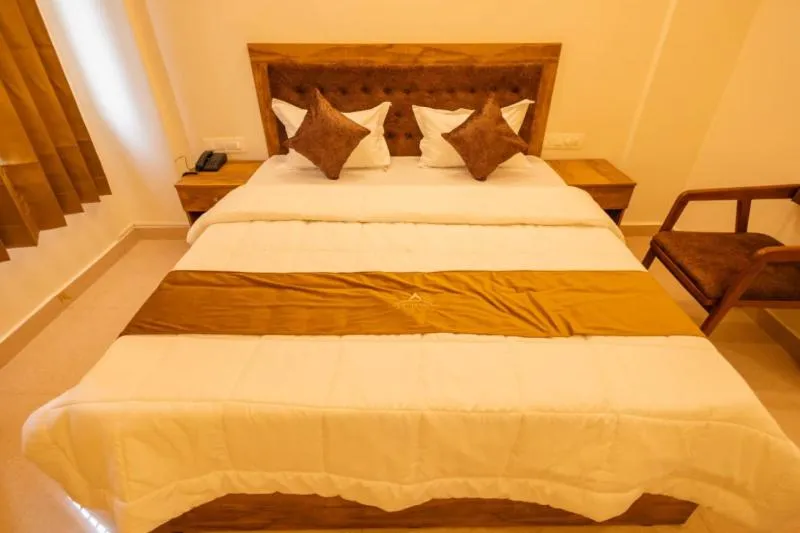 Bed in Uptown Suites