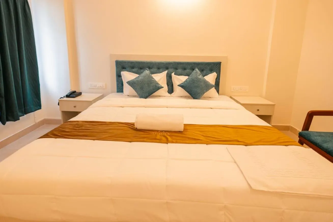 Bed in Uptown Suites