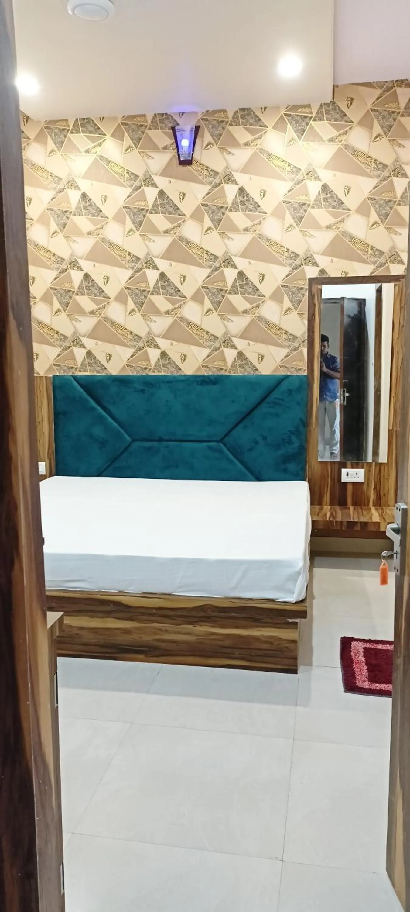 Bed in Hotel Keshavam inn