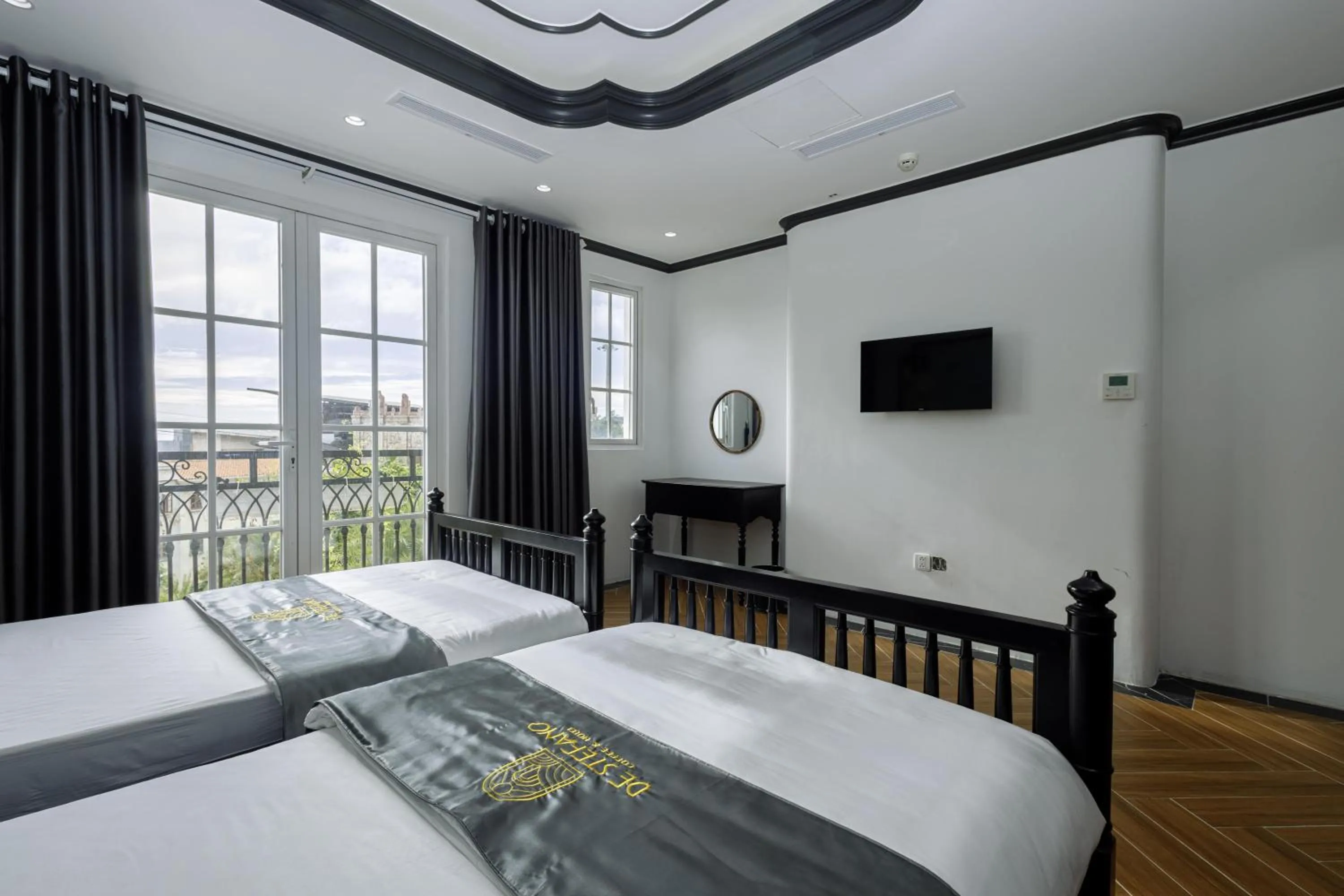 Bed in De Stefano Coffee and Hotel