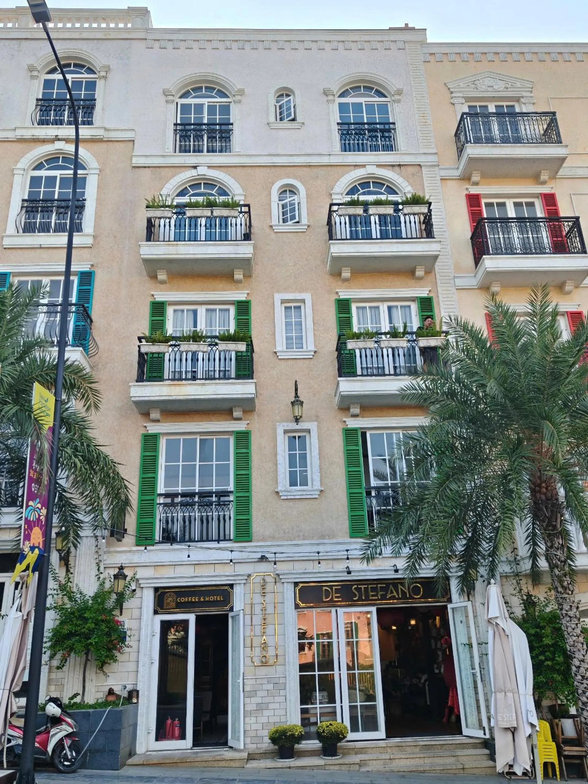 Property building in De Stefano Coffee and Hotel