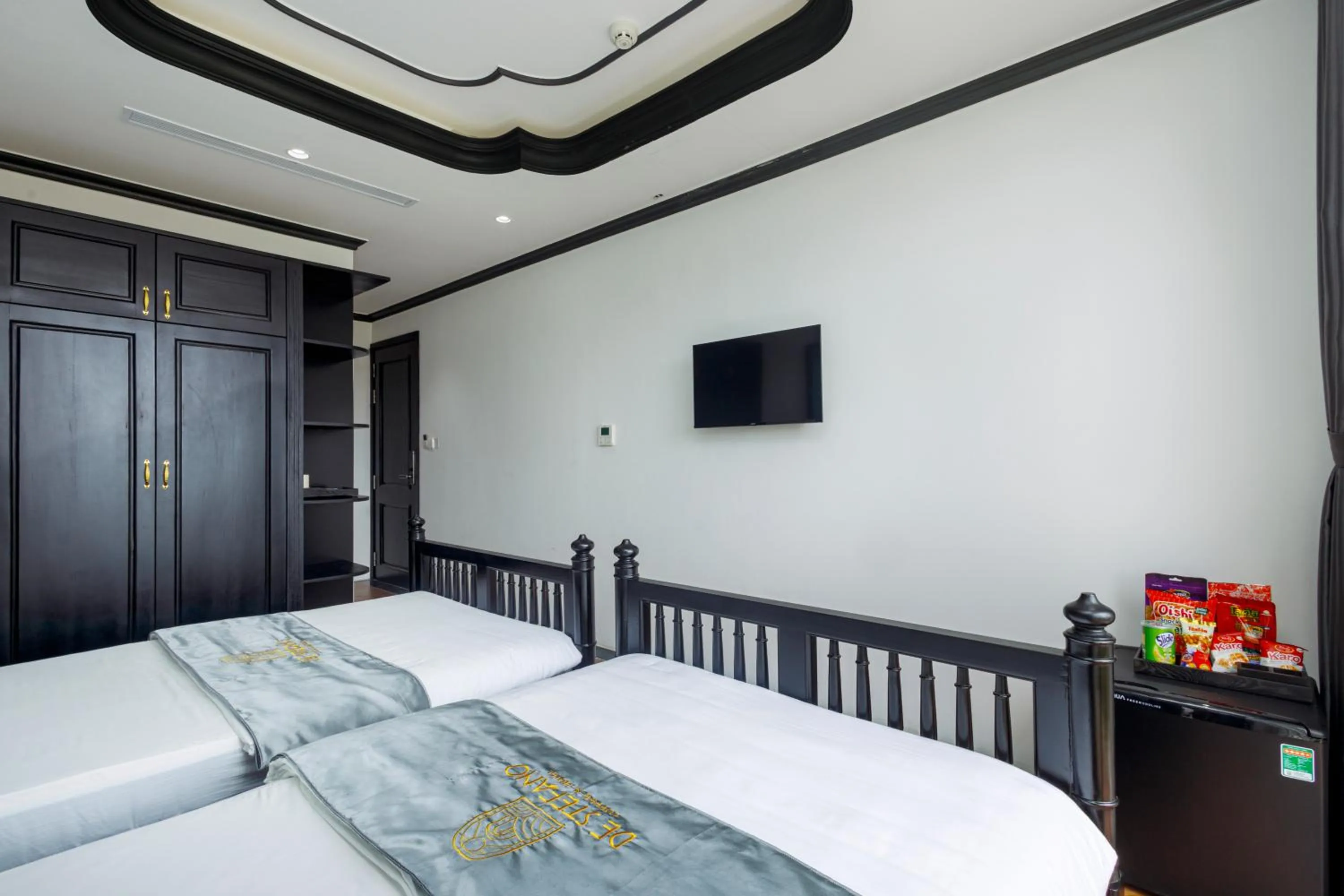 Bed in De Stefano Coffee and Hotel